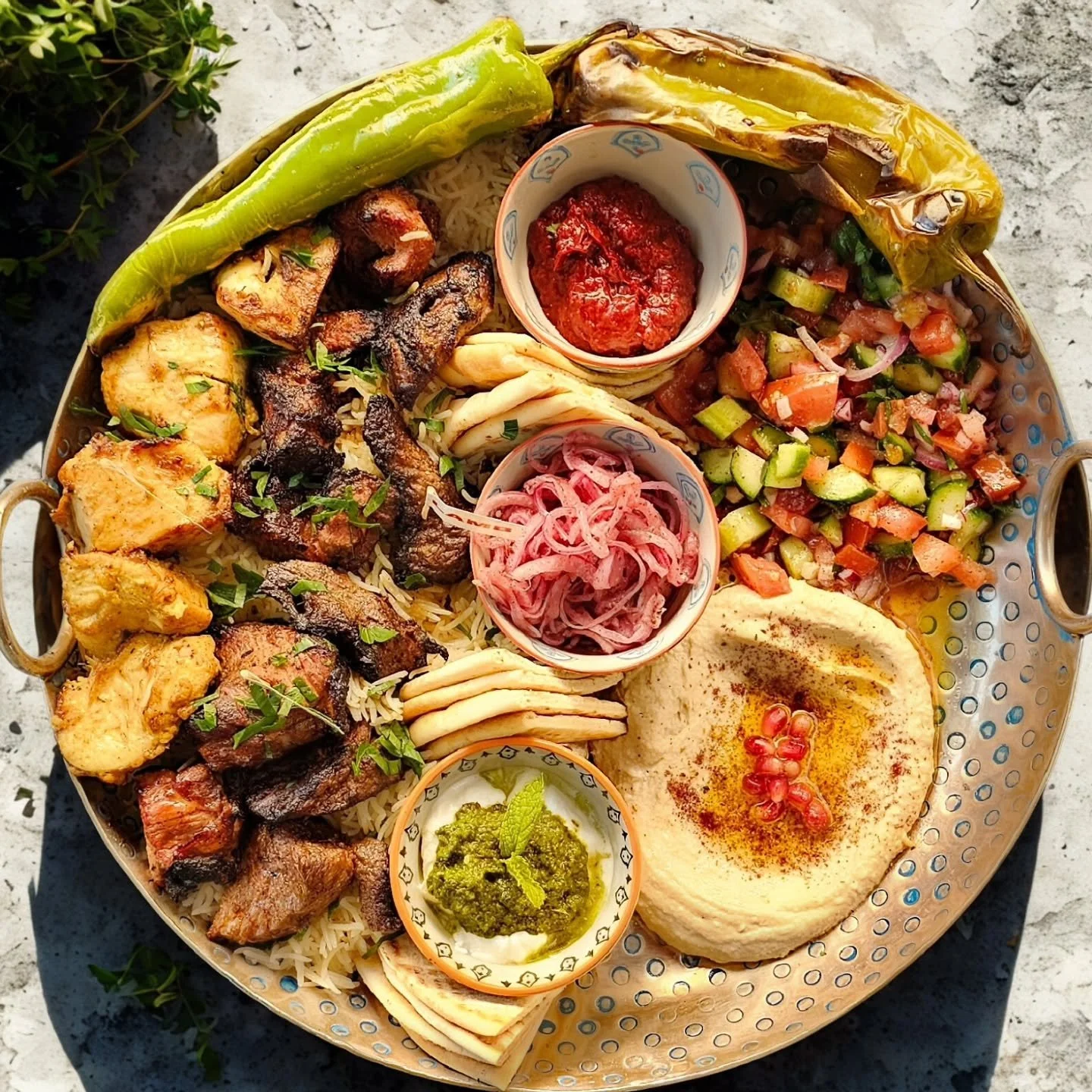 🔥 Dinner plans? We&rsquo;ve got something sizzling just for you.
This Mediterranean platter brings the flavor &mdash; juicy grilled meats, creamy hummus, fresh salad, and bold sauces. Every bite tells a story.

Perfect for sharing, made for craving.