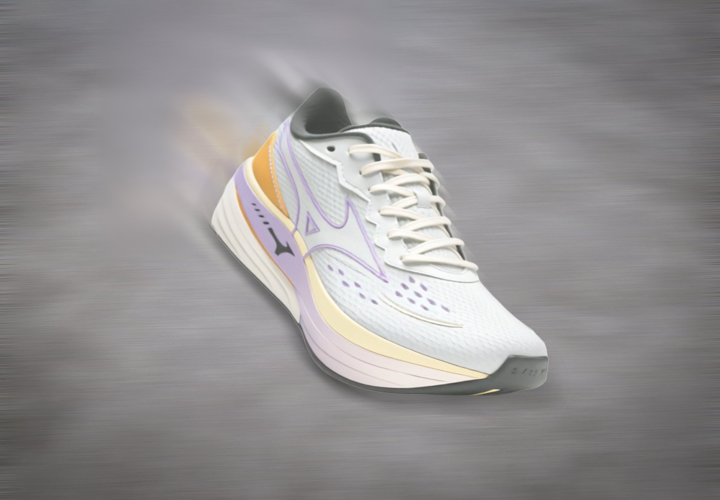 A white running shoe with purple, black, and yellow accents is shown in motion on a grey surface.
