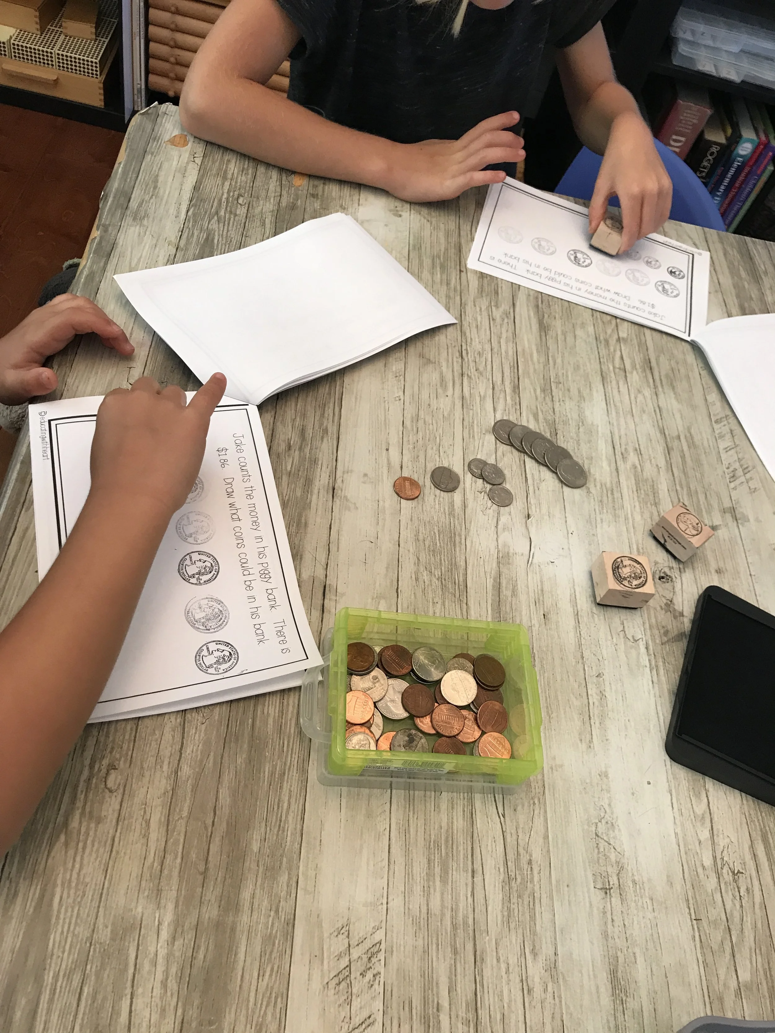 children learn about money during elementary homeschool