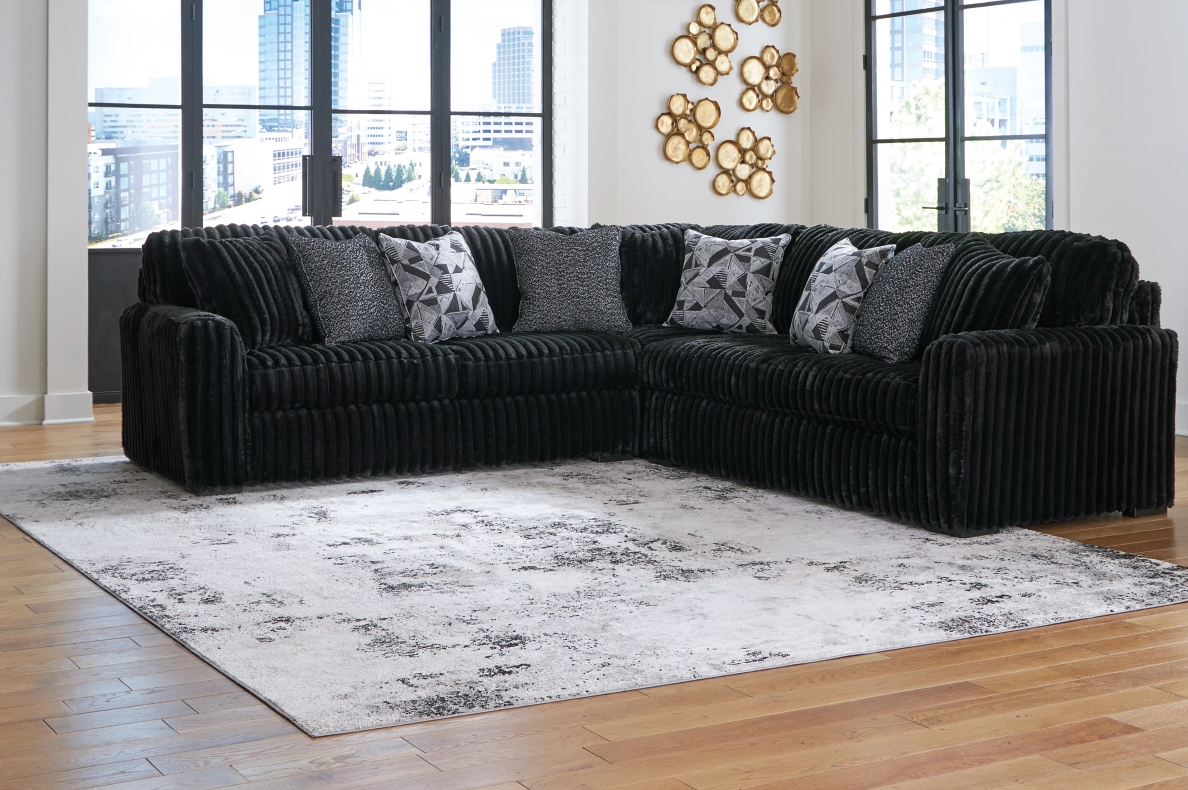3PC Sectional $2,000 (98103S6) Color: Black
Features: Attached Back & Reversible Seat Cushions, Accent Pillows Included, High Resiliency Foam Cushions, Polyester Upholstery 