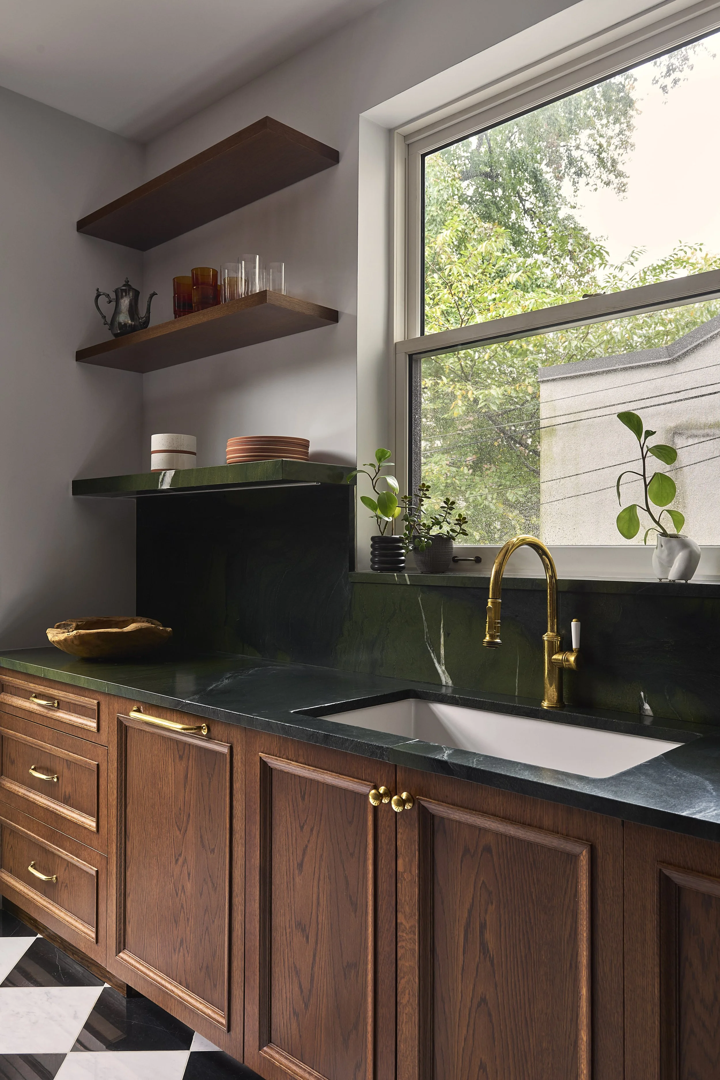 bespoke stone and wood shelves and cabinetry