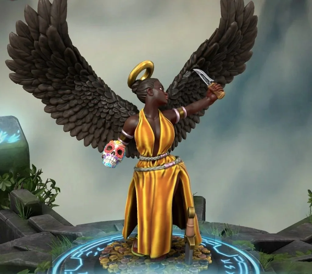Statue of a female angel with large wings, wearing a yellow dress with a halo, holding a knife in one hand and a colorful skull in the other, standing on coins surrounded by green plants.