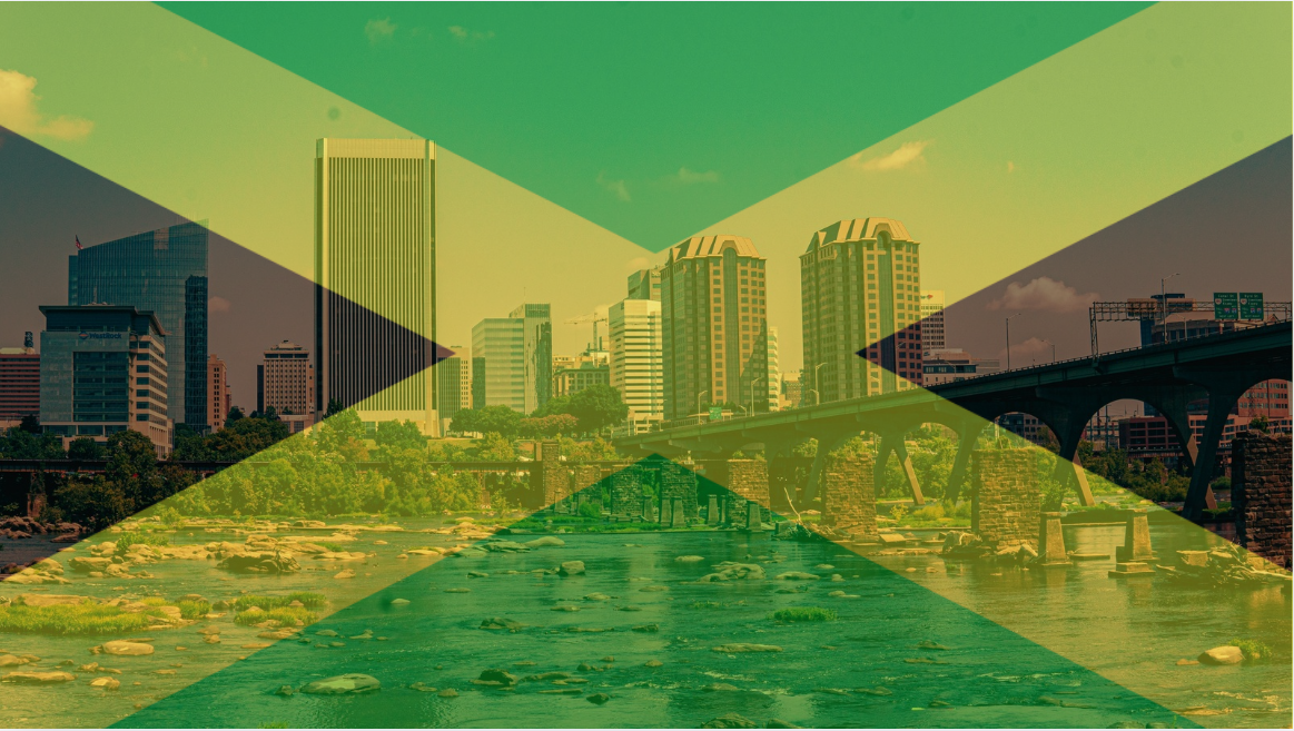 City skyline with tall buildings over a river, with a bridge in the foreground, overlaid with a semi-transparent Jamaican flag.