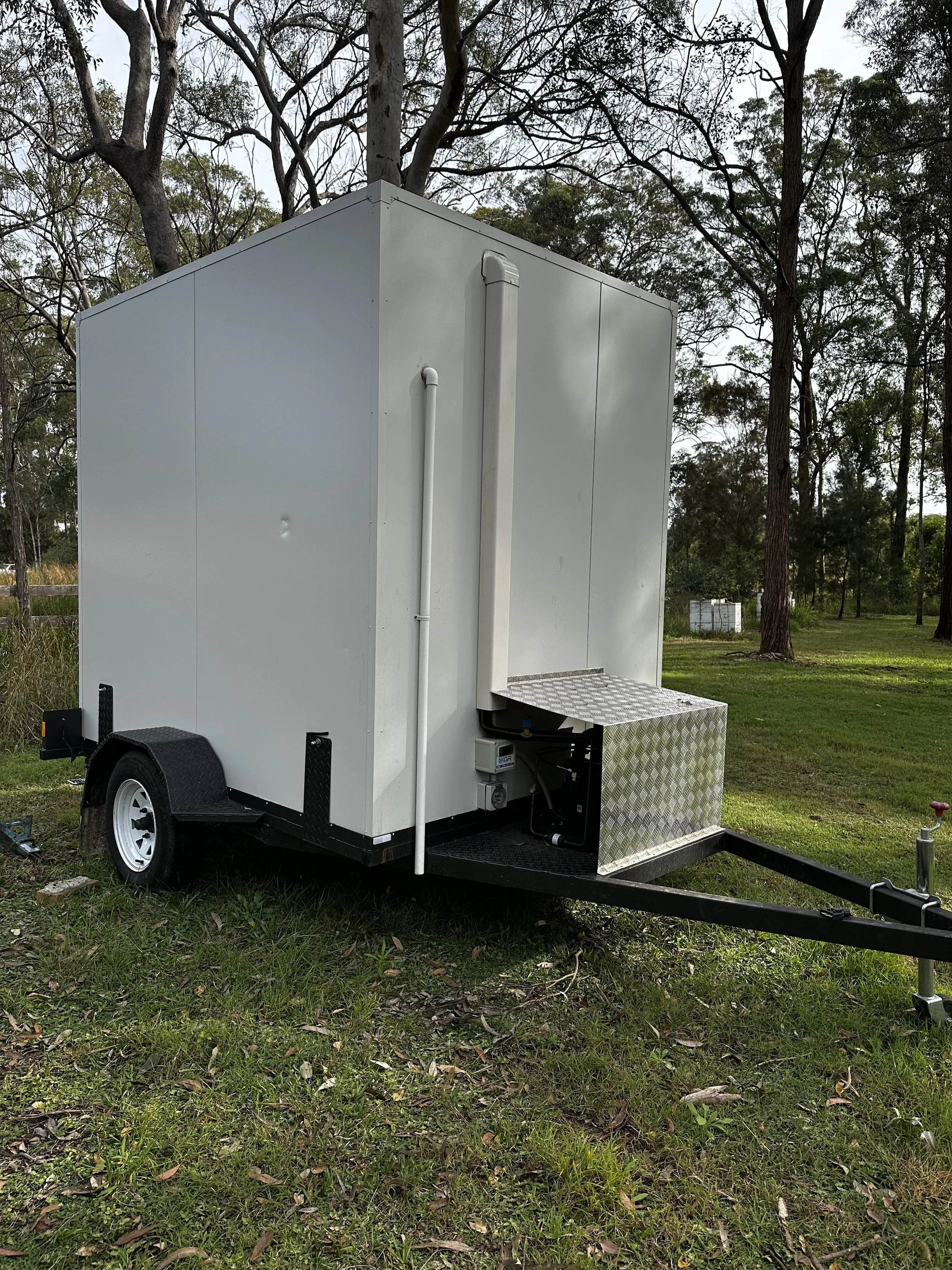 Image of white freezer room on wheels