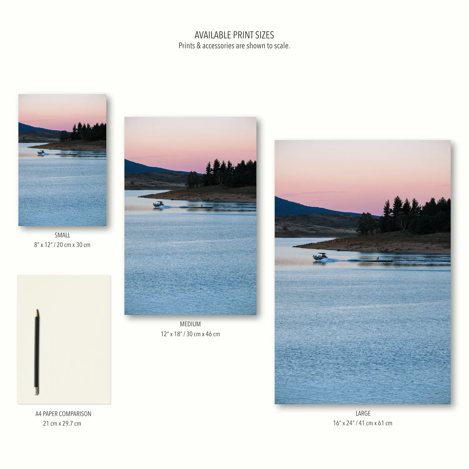 Three vertical prints of the Alpine Twilight scene shown in small, medium, and large sizes with props for scale.