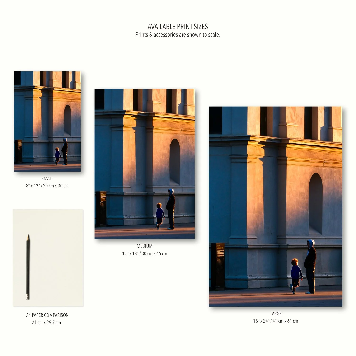 Three size options of the Where the Light Lands print are displayed to scale on a cream canvas, together with stationery for context.
