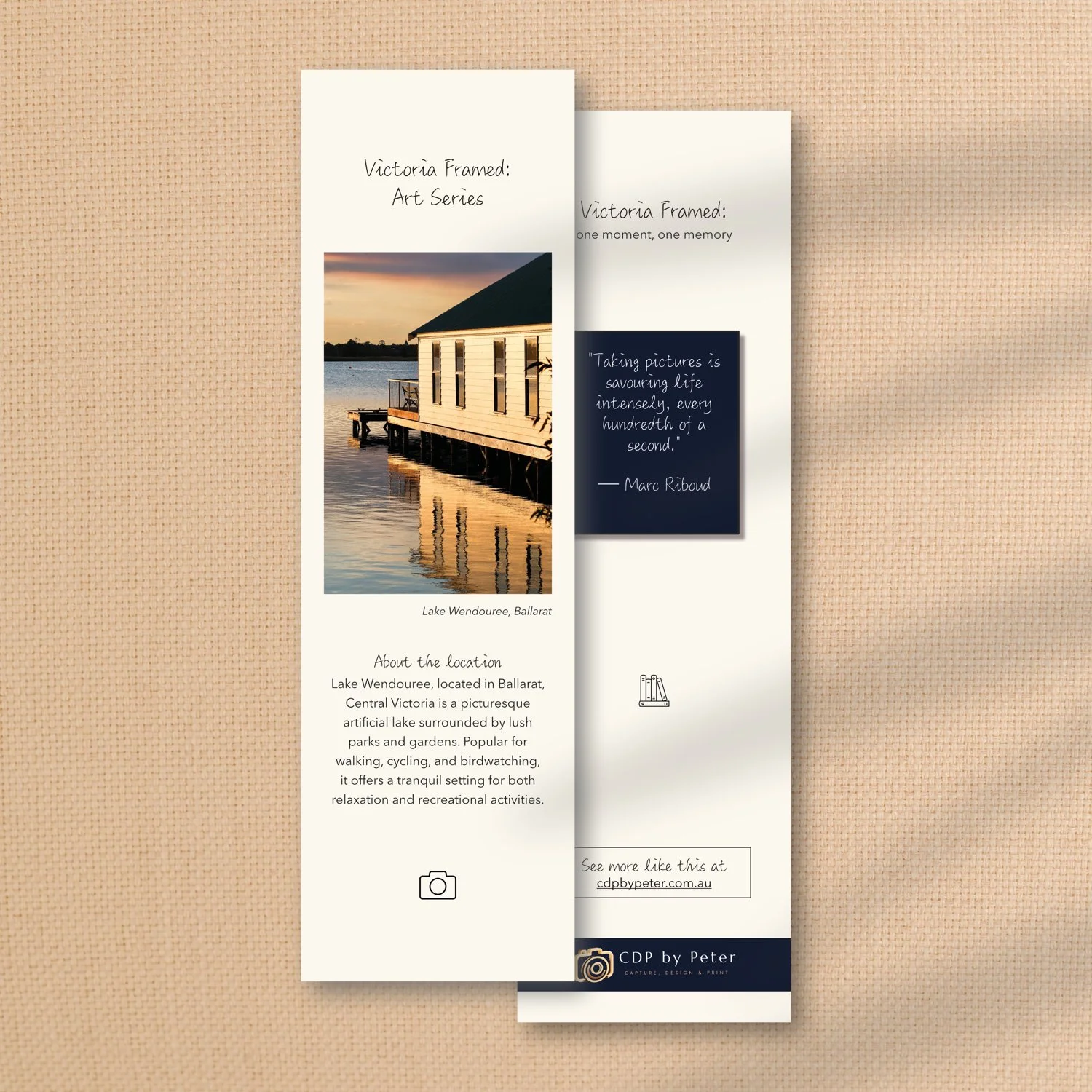 From the collection of Victoria Framed Premium Bookmarks here shown is one item, featuring a boathouse and reflections on side 1 and an adage on side 2.