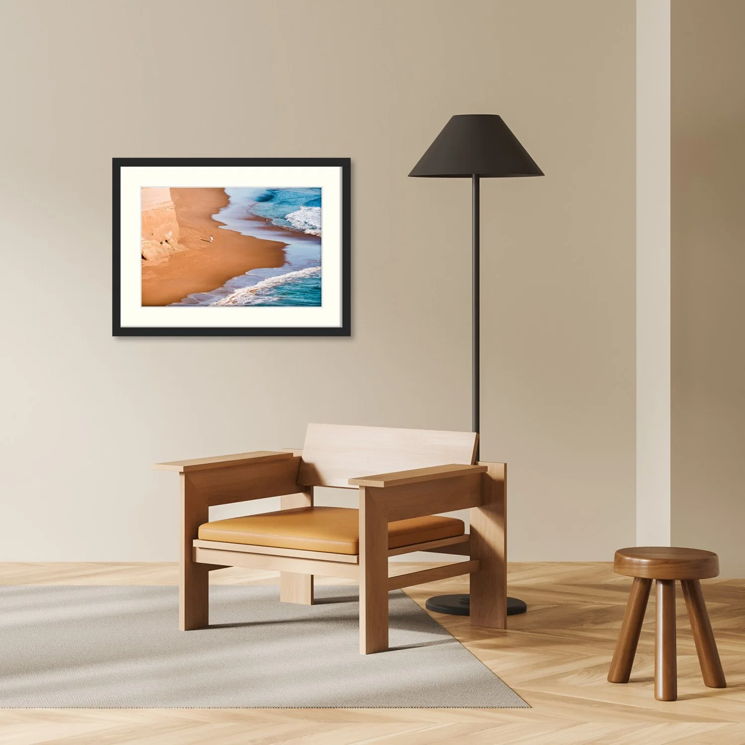 Horizontal Tidal Paths fine art print in a minimalist black frame, displayed above a timber chair to show scale and coastal tranquility.