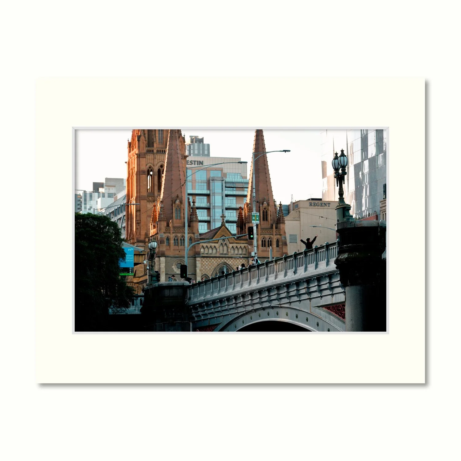 Princes Perspective: a frame mount containing a photo of a historic Melbourne bridge and Gothic cathedral beside modern city buildings.