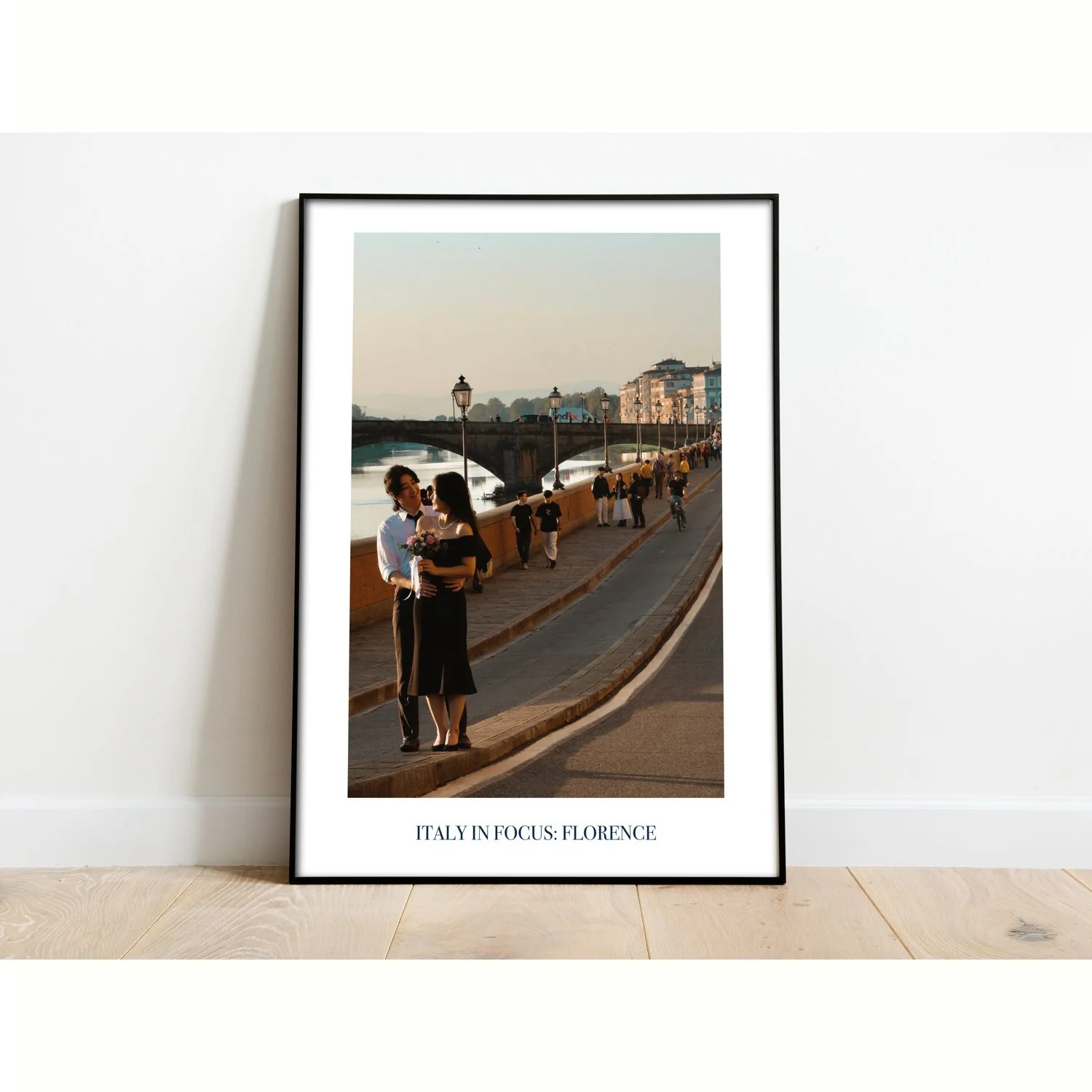 The poster entitled Italy in Focus: Florence is framed and sitting on the floor.