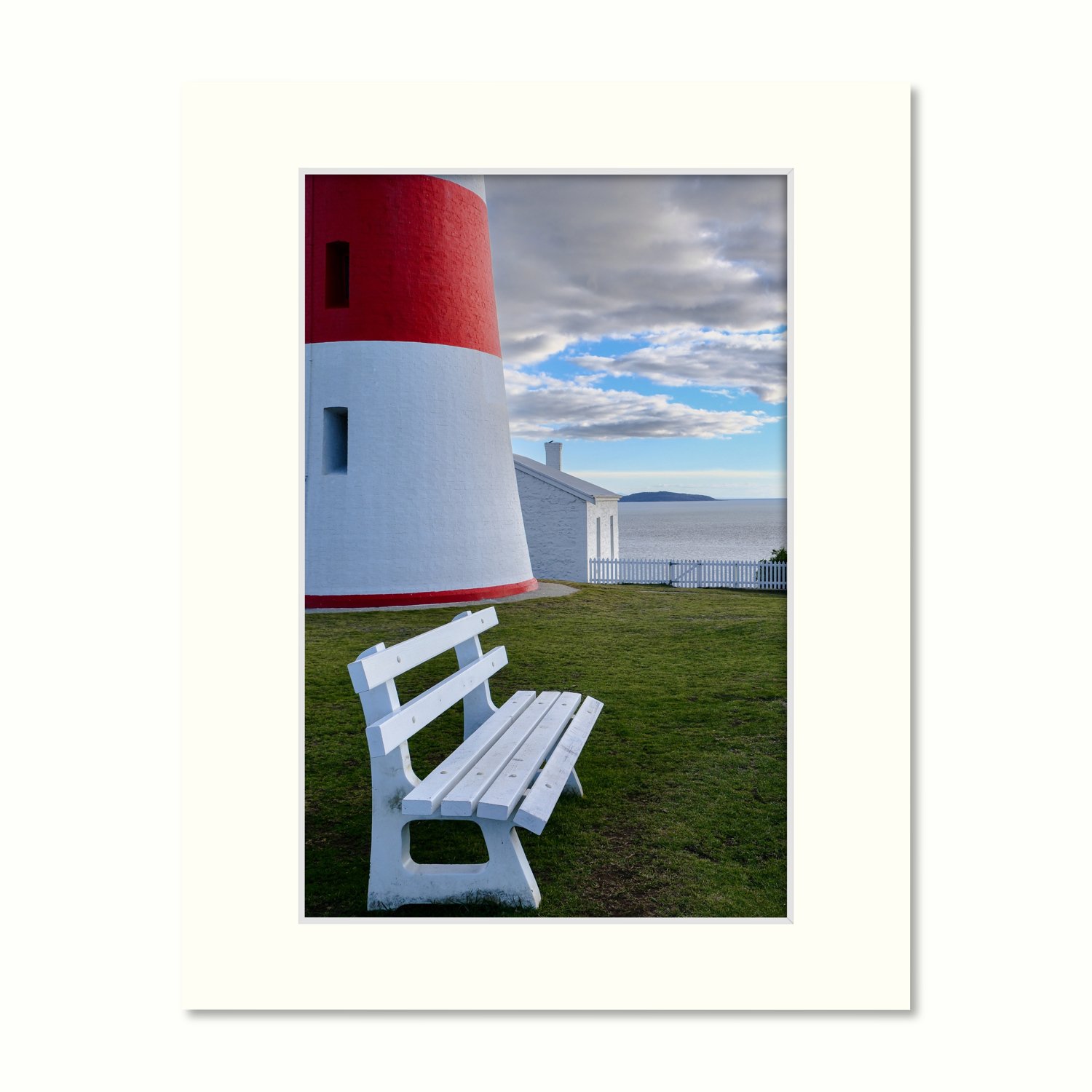 Low Head Sentinel Ready to Frame Print – a frame mount containing a photo of part of a red and grey lighthouse in a historical setting.