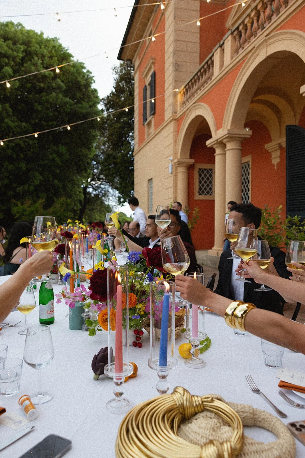  Colorful wedding tablescape with flowers, fruits and contemporary styling at Villa Lena in Tuscany, designed by Sand+Lace 
