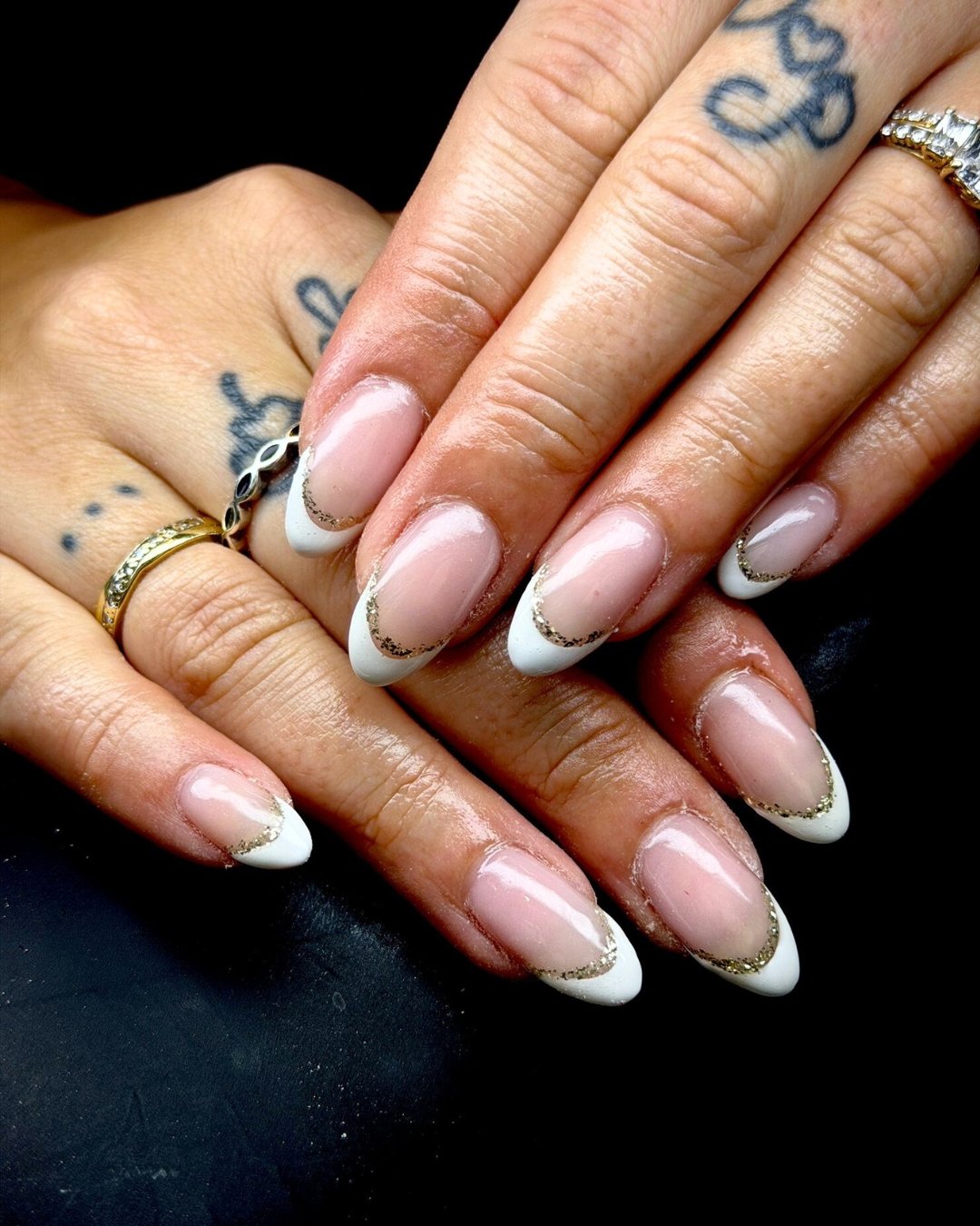 French tip with a delicate line of golden glitter, it&rsquo;s simple, a classic but elevated. OBSESSED! 🤍

@rosie_generationsbeautynails 
@homeofnailart 

#nailscornwall #nailsaloncornwall #nailtechcornwall  #beautysaloncornwall #honanails