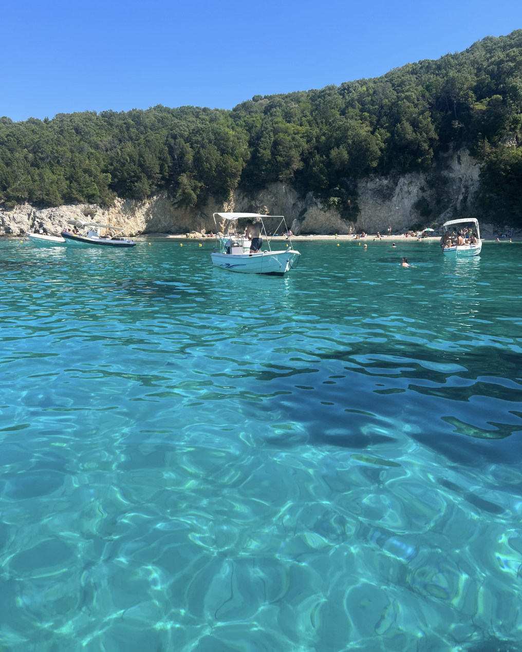 View from private boat sailing in Syvota, Greece, recommended by Travel by Angela