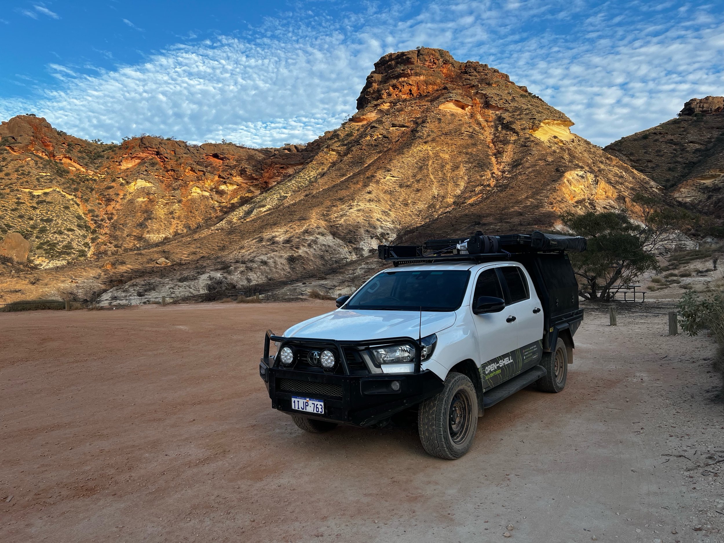 Touring-ready 4WD camper with lithium power, fridge, awning and rooftop tent for travellers searching Perth 4x4 hire and off-road camper rental options.