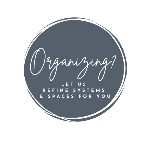 A round dark gray logo with white text that says 'Organizing? Let us refine systems & spaces for you.'