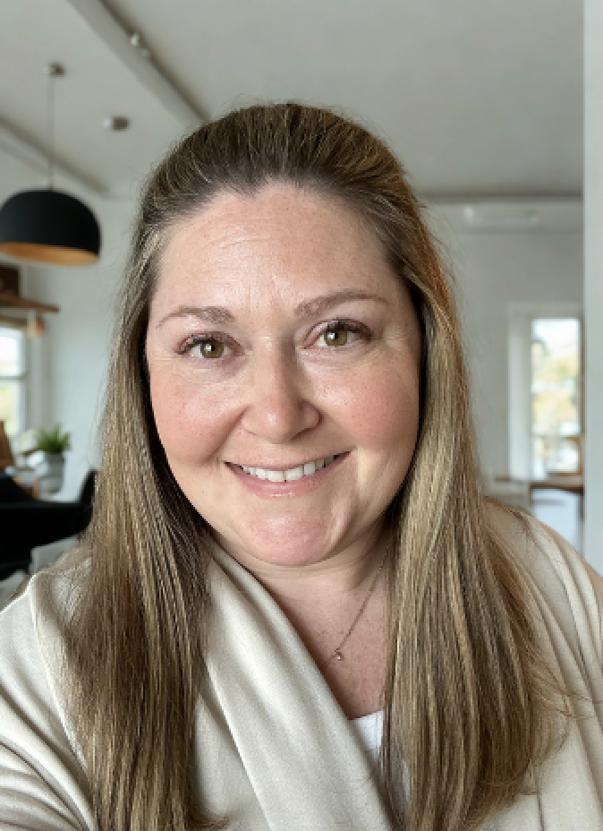 A close up photo of Alison smiling, owner of company.