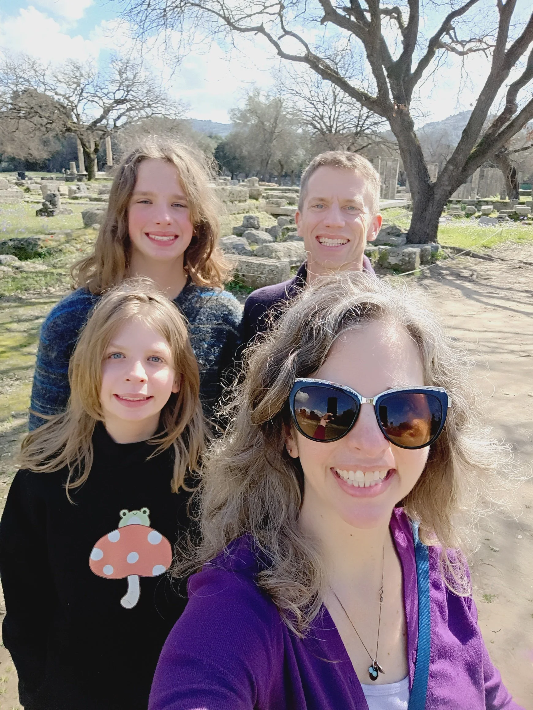 Colleen Pacem and her family at the ancient ruins of Olympia, Greece