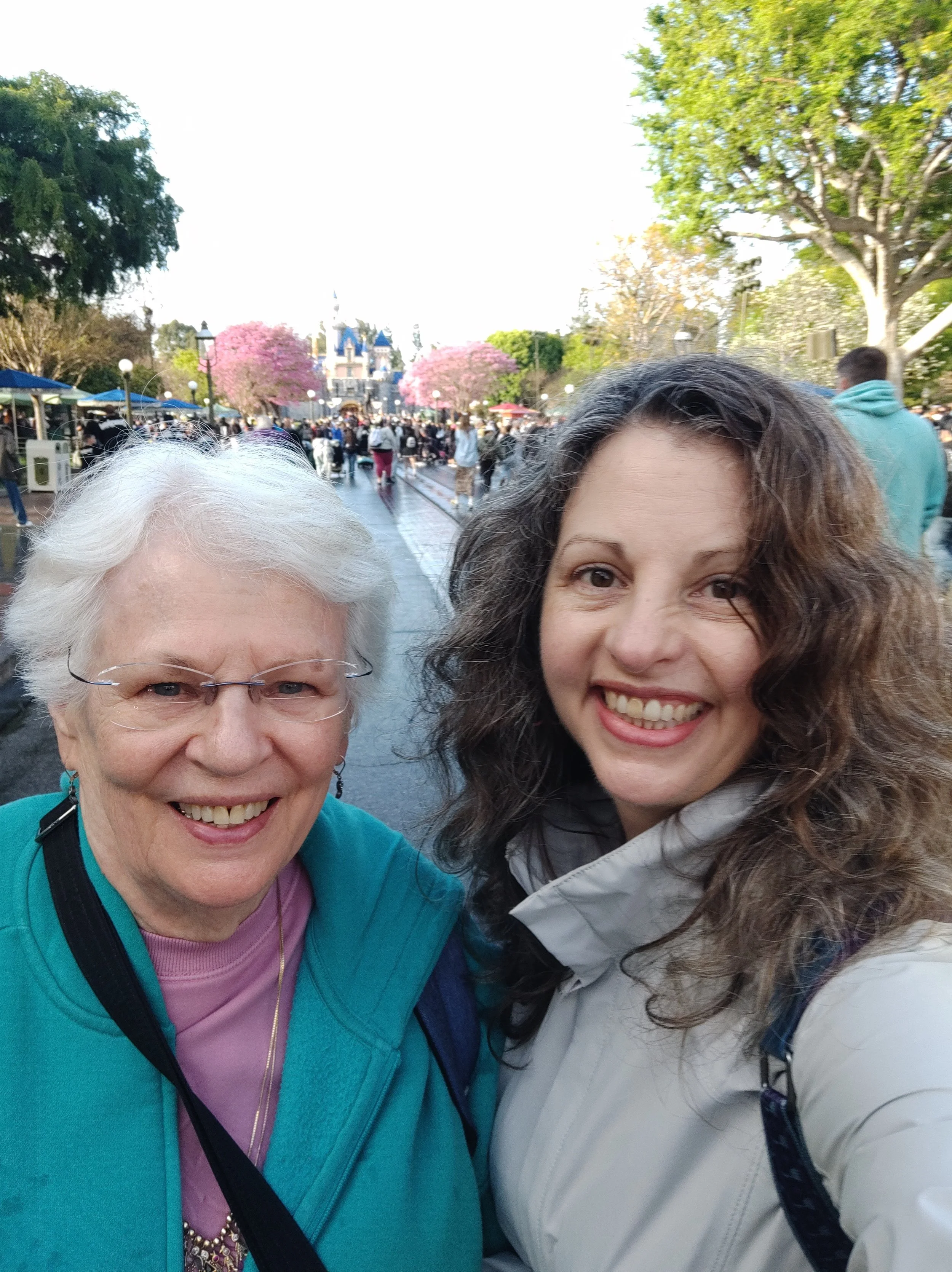 Colleen Pacem and her mother traveling in Disneyland