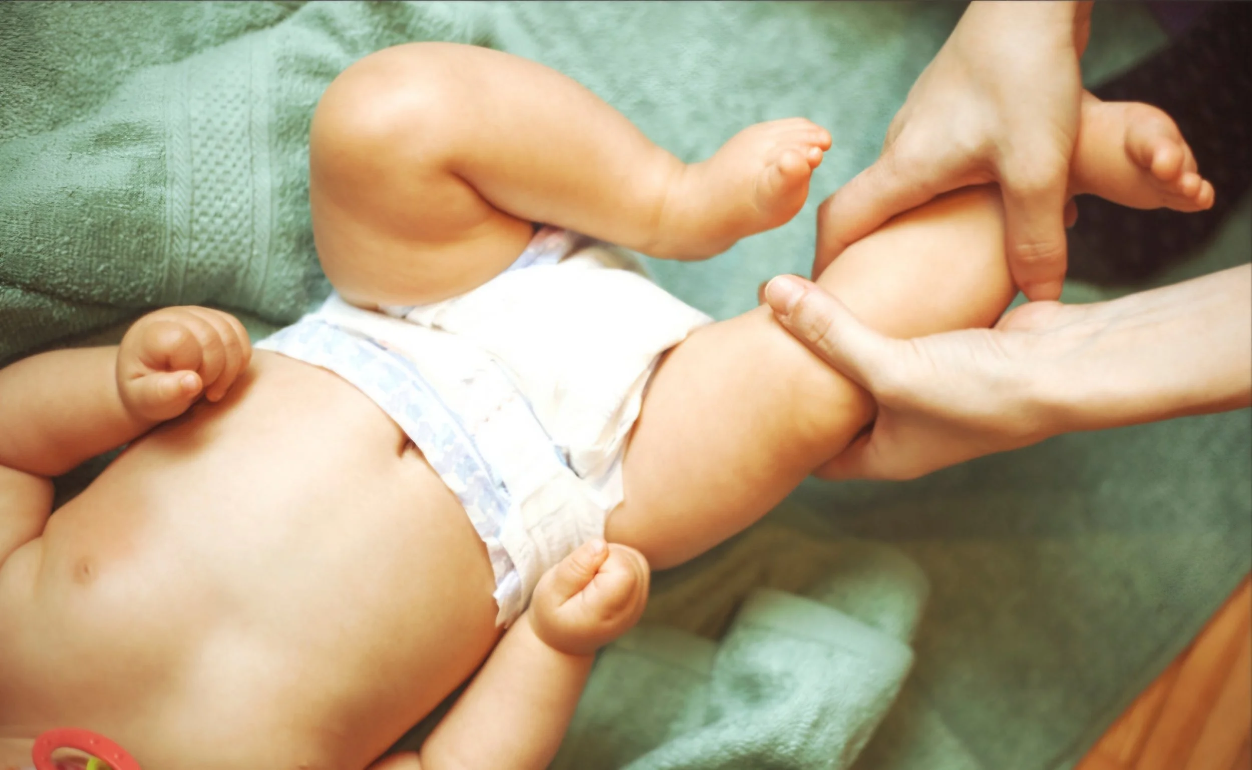 baby massage, infant massage, pediatric massage, overstimulated infant, stress reducing