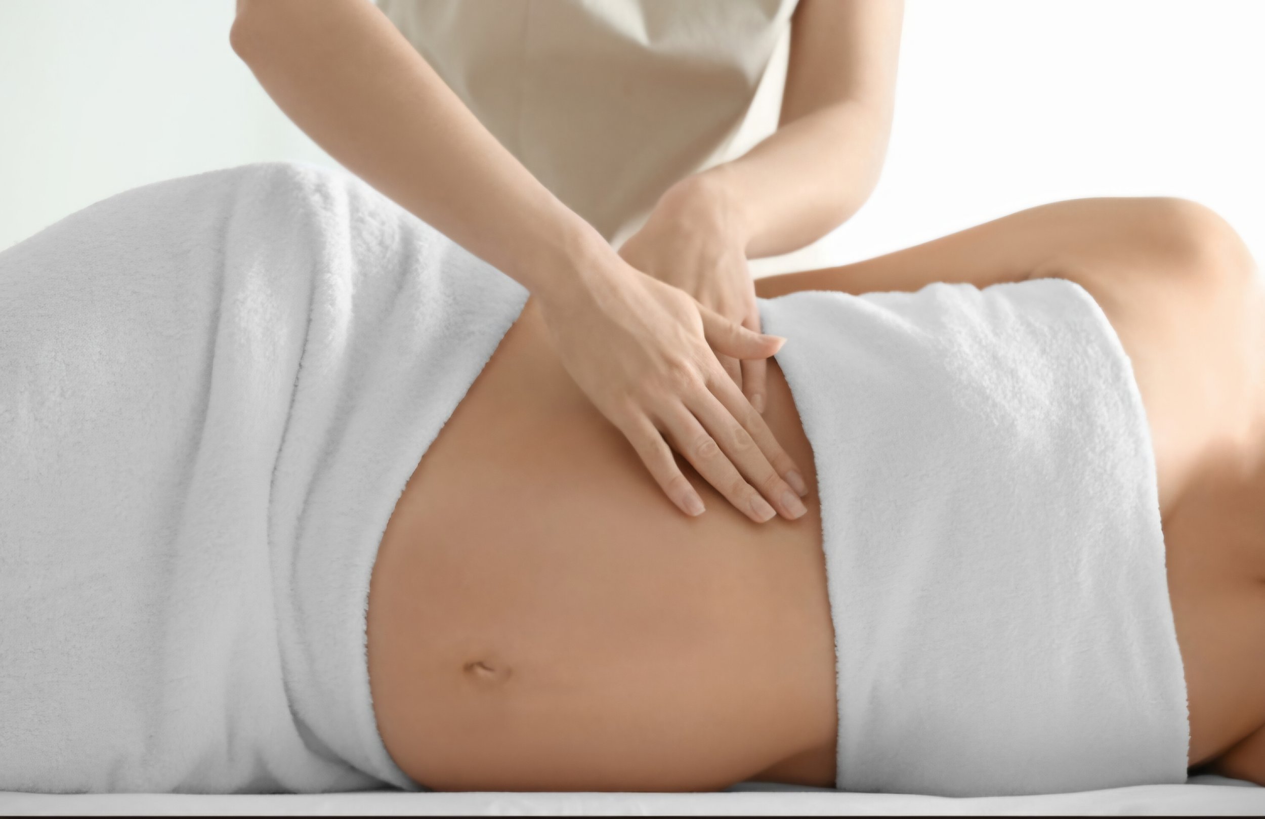 Pregnancy Massage, Prenatal massage, sideline massage, pillow supported pregnancy massage.
