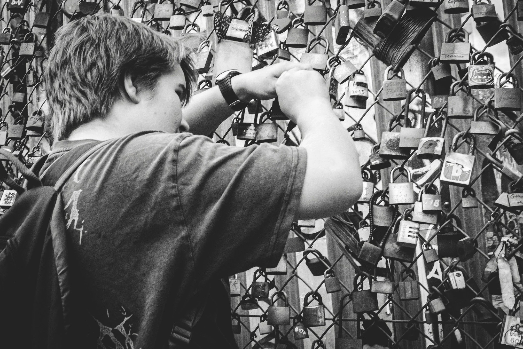 Love locks are everywhere now, but I like catching the moment they&rsquo;re actually placed. It&rsquo;s less about the clich&eacute; and more about the human gesture behind it, someone pausing to make a mark, however small, in the middle of the city.