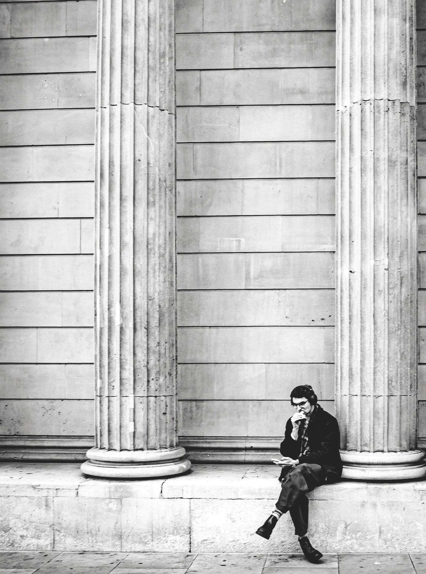 He sat there wrapped in his own thoughts, tucked between stone pillars like a secret he didn&rsquo;t know he was giving away.
That soft pause&hellip; that private drift&hellip; it&rsquo;s the moment people forget the world is watching, so their truth