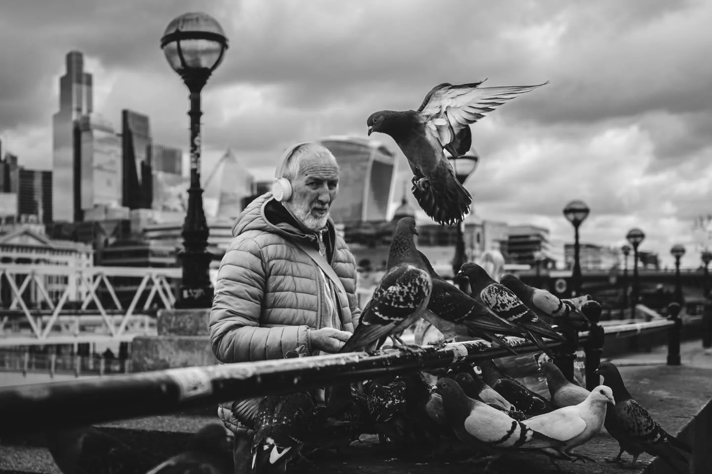 He fed them once&hellip; now they never leave.
Funny how the things we nurture are the ones that consume us.

#StreetPhotography #LondonStreets #BlackAndWhitePhotography #BnWStreet #StreetLife