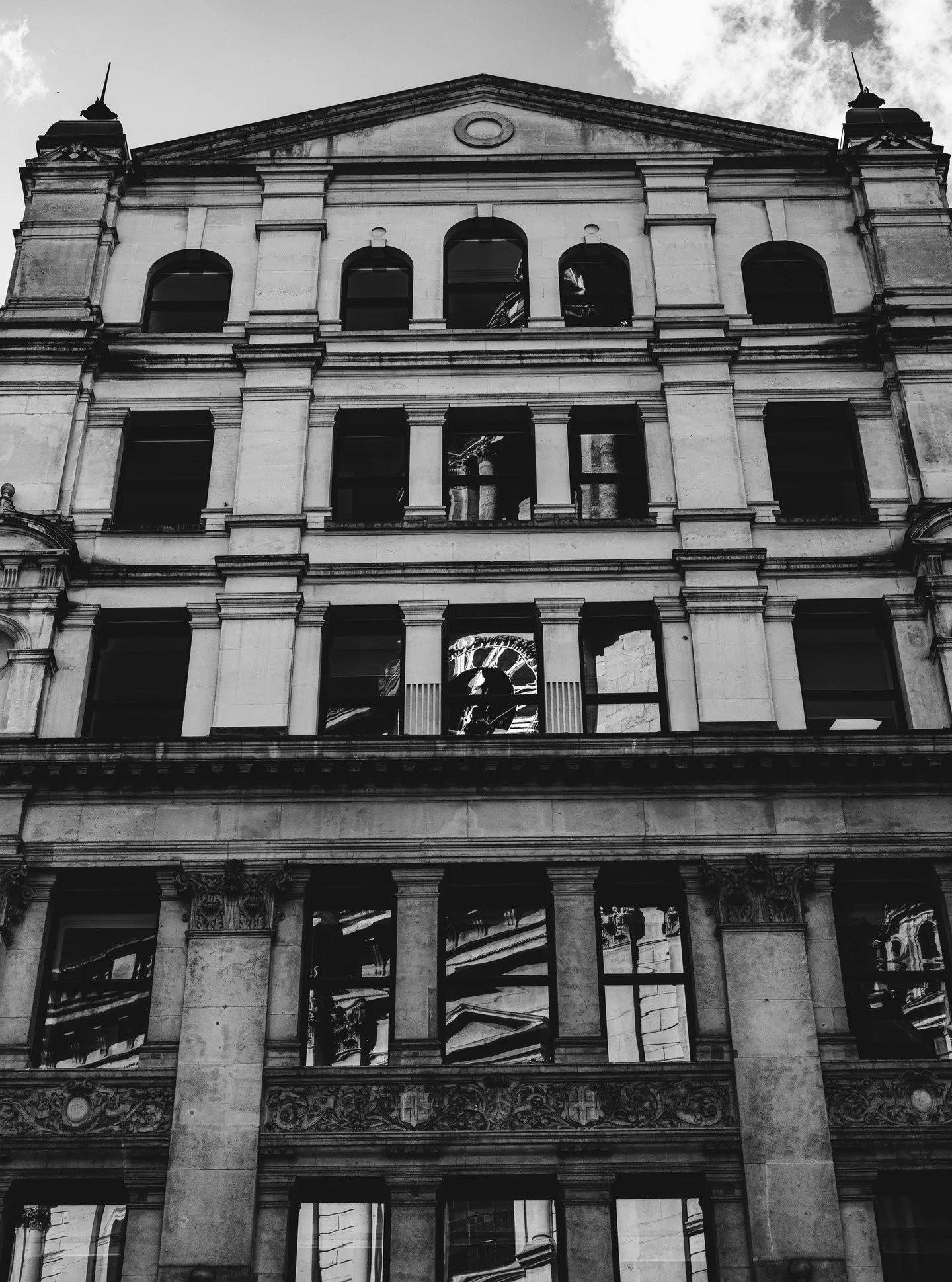 Saint Paul&rsquo;s clock,
caught in someone else&rsquo;s window. 
#blackandwhite #streetphotography #londonarchitecture #bnwphotography #urbanframes