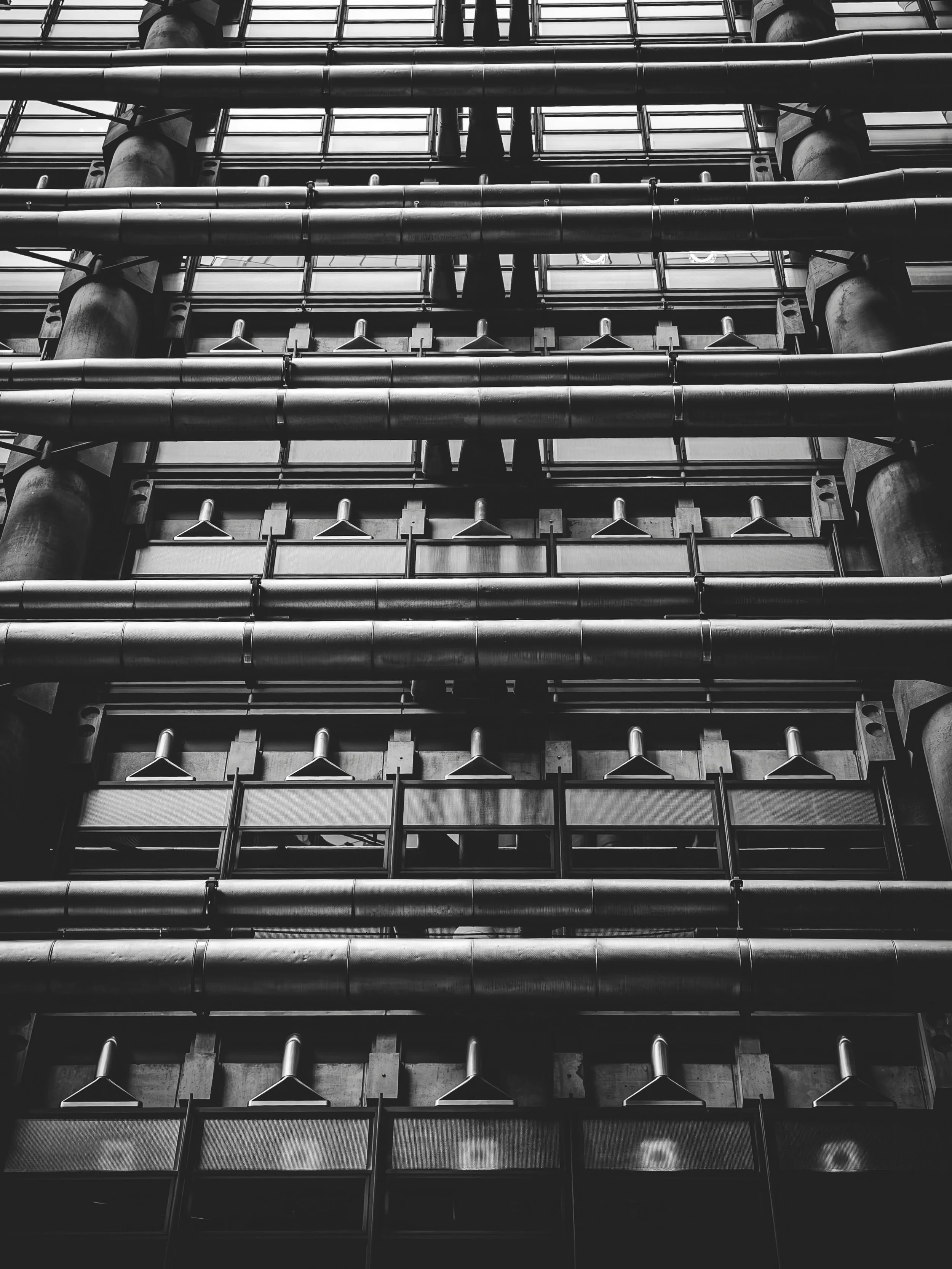 Everyone in this building probably says they&rsquo;re &ldquo;just tired&rdquo; instead of admitting they&rsquo;re miserable. #blackandwhitephotography
#urbanisolation
#streetphotography
#brutalistarchitecture
#moodygrams