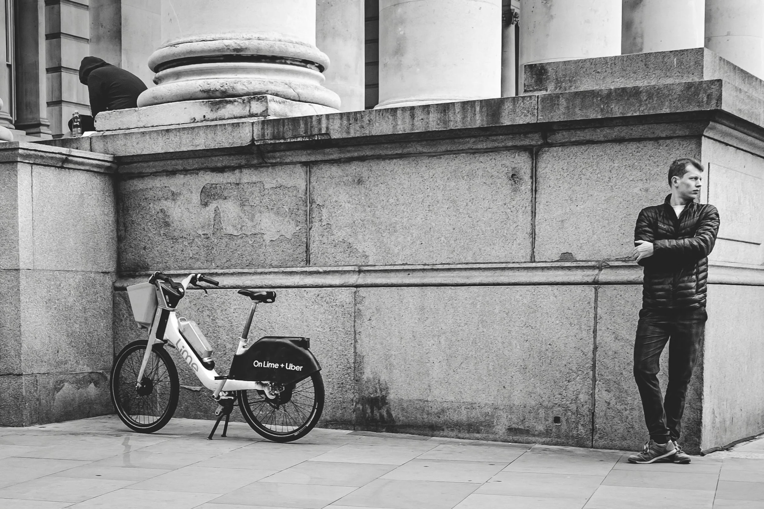 The man in the corner looked like he&rsquo;d mastered the art of disappearing in public&hellip;. Not him&hellip; The other one #streetphotography
#urbanphotography
#bnw_mood
#humaninterest
#streetportraiture