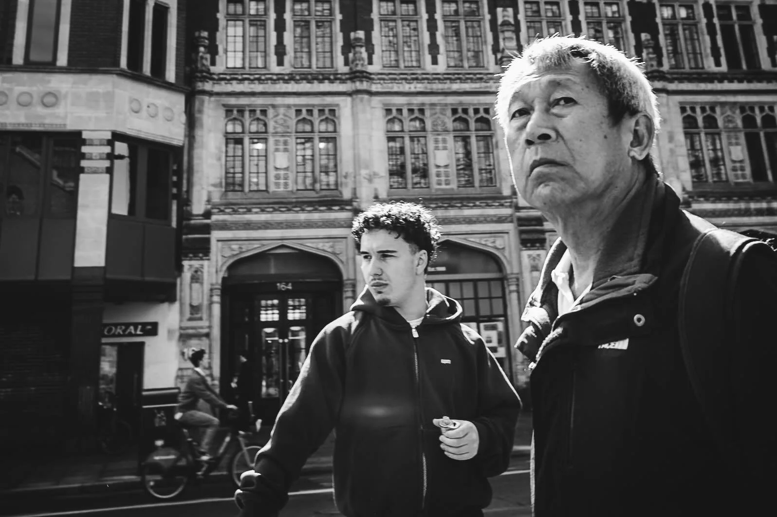 What caught my attention wasn&rsquo;t where they were looking.

It was the expression.

Two different generations wearing almost exactly the same one. #MonochromeMoments
#StreetPhotography
#BlackAndWhitePhotography
#DocumentaryPhotography
#HumanBehav