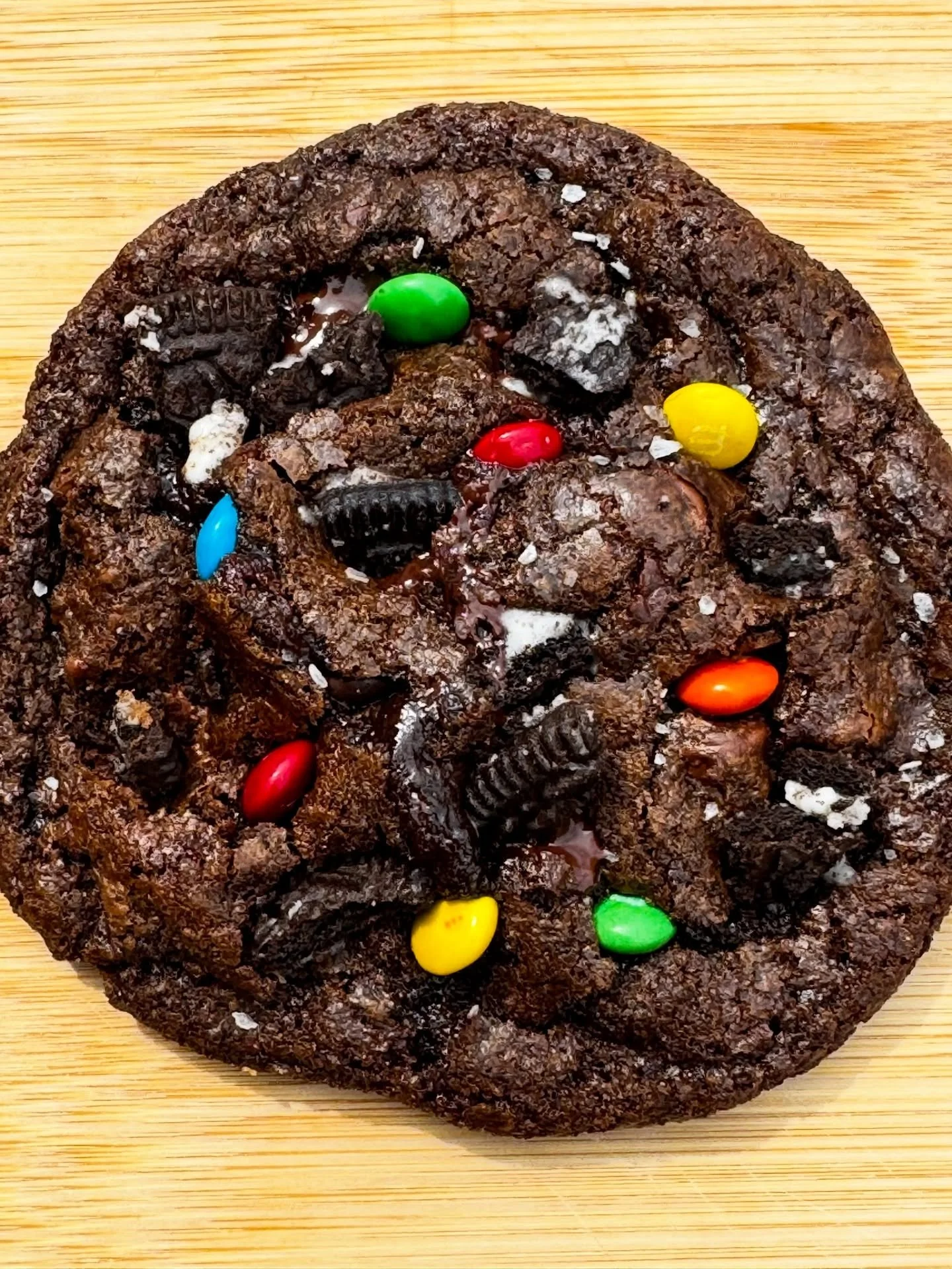 The Choco Mama 🍫🤎
This one became an instant favorite for all our chocolate lovers &mdash; rich, gooey, double chocolate goodness with three kinds of chocolate in every bite. 

✨ Load it with Mini M&amp;Ms + crushed Oreo
✨ Finished with our signatu