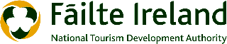 Logo of Failte Ireland, the National Tourism Development Authority of Ireland, featuring a stylized shamrock inside a circle with text.