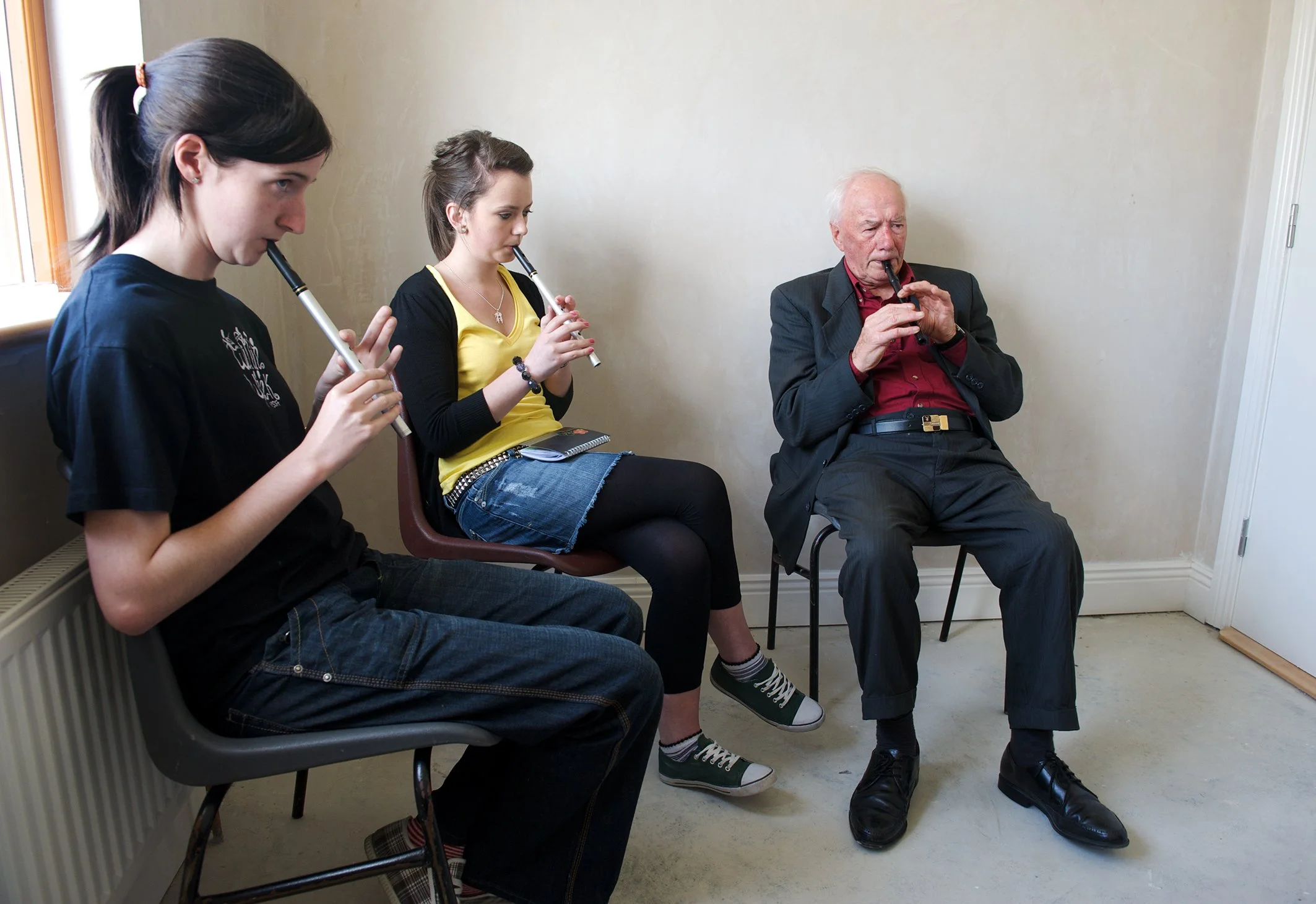Michael Falsey with two of his tin whistle students 2009.