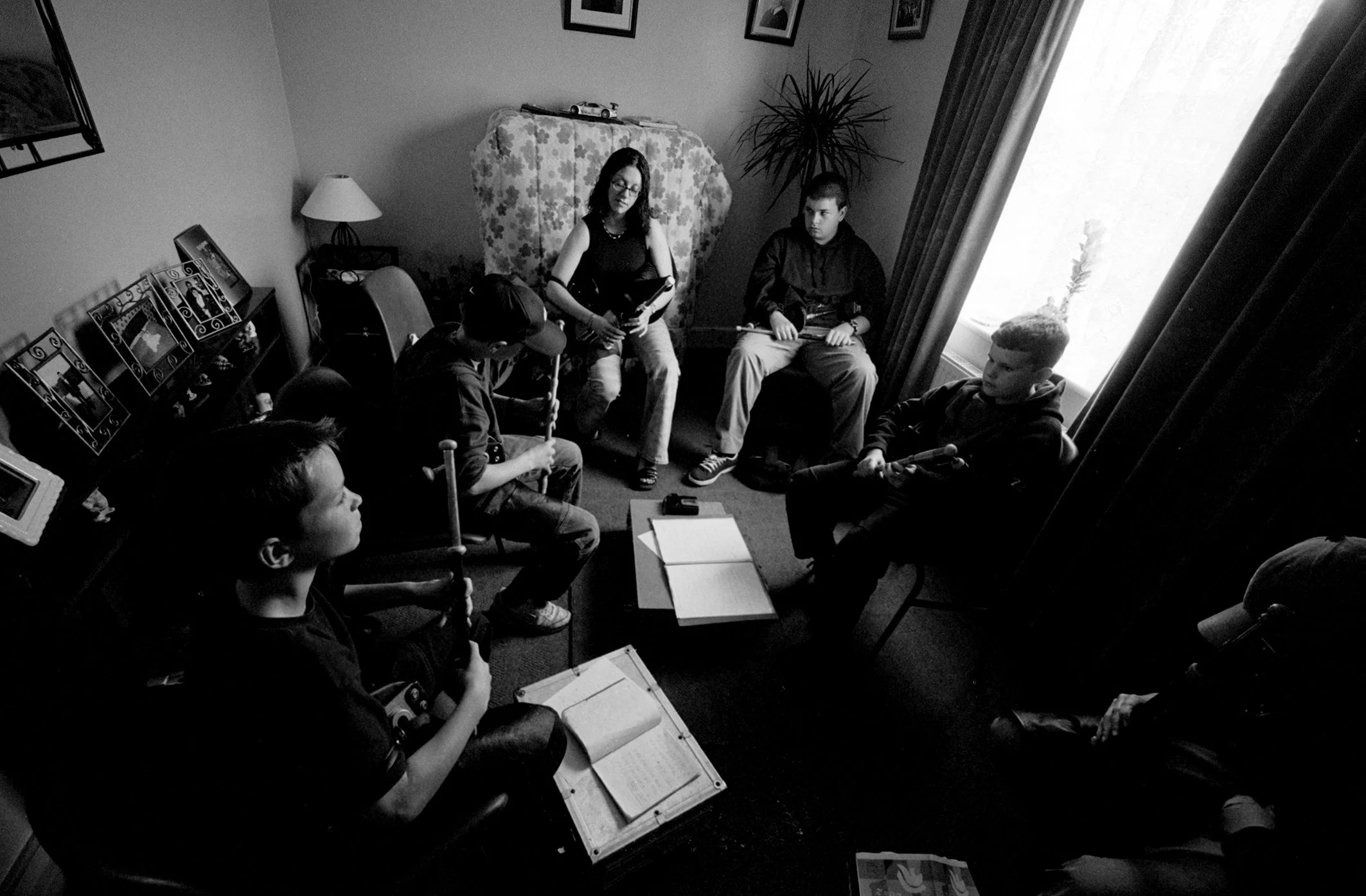 Sorcha Ni Mhuirí with her uilleann pipes class 2001.