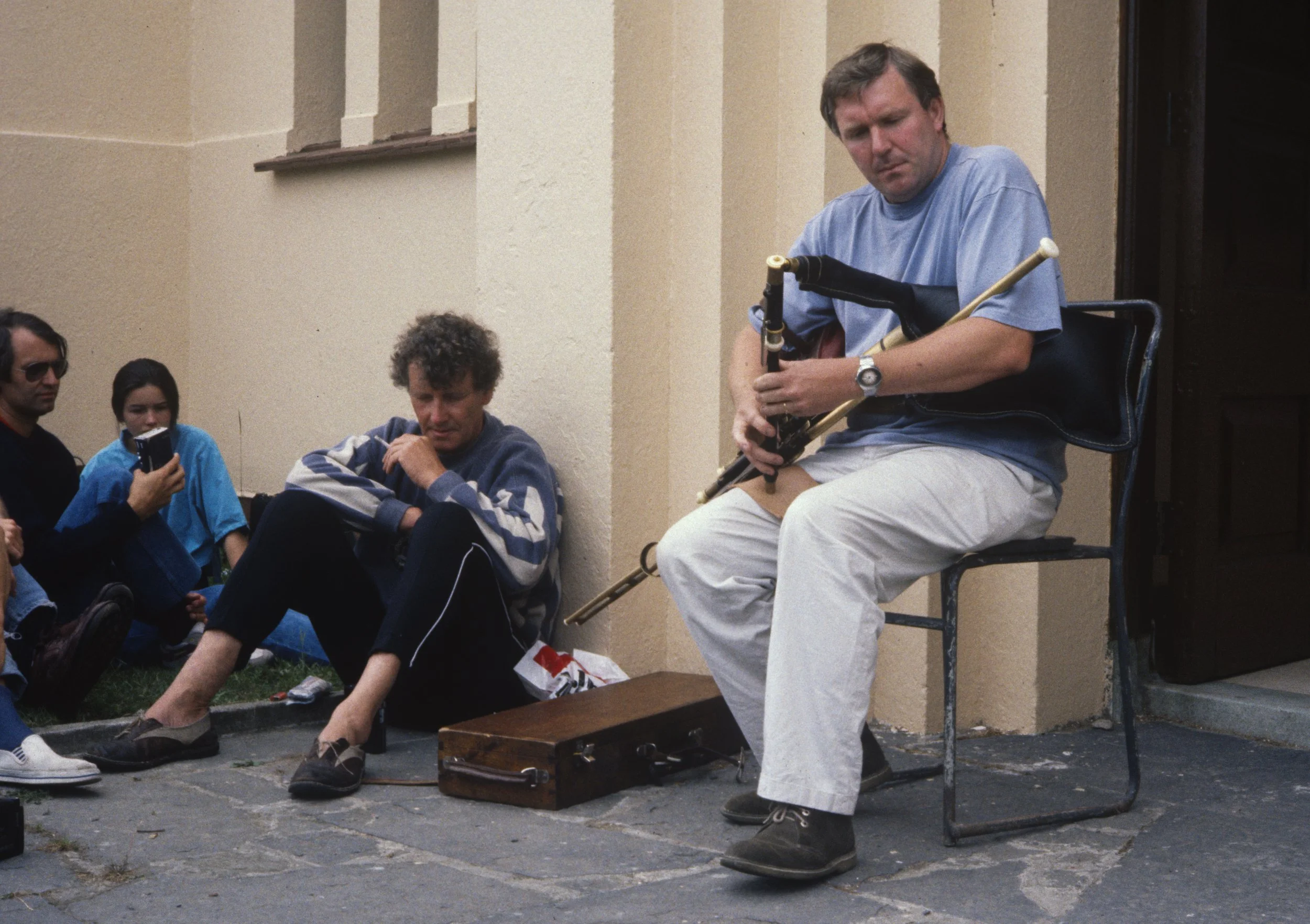 Tommy Keane playing in an outdoors piping recital 1992.