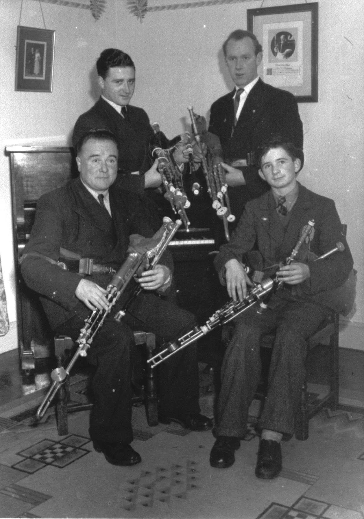 The Rowsome Quartet, circa 1952, with Leo and Leon Rowsome seated, Seán Seery and Willie Clancy standing.
Photo courtesy of Helena Rowsome-Grimes and NPU.