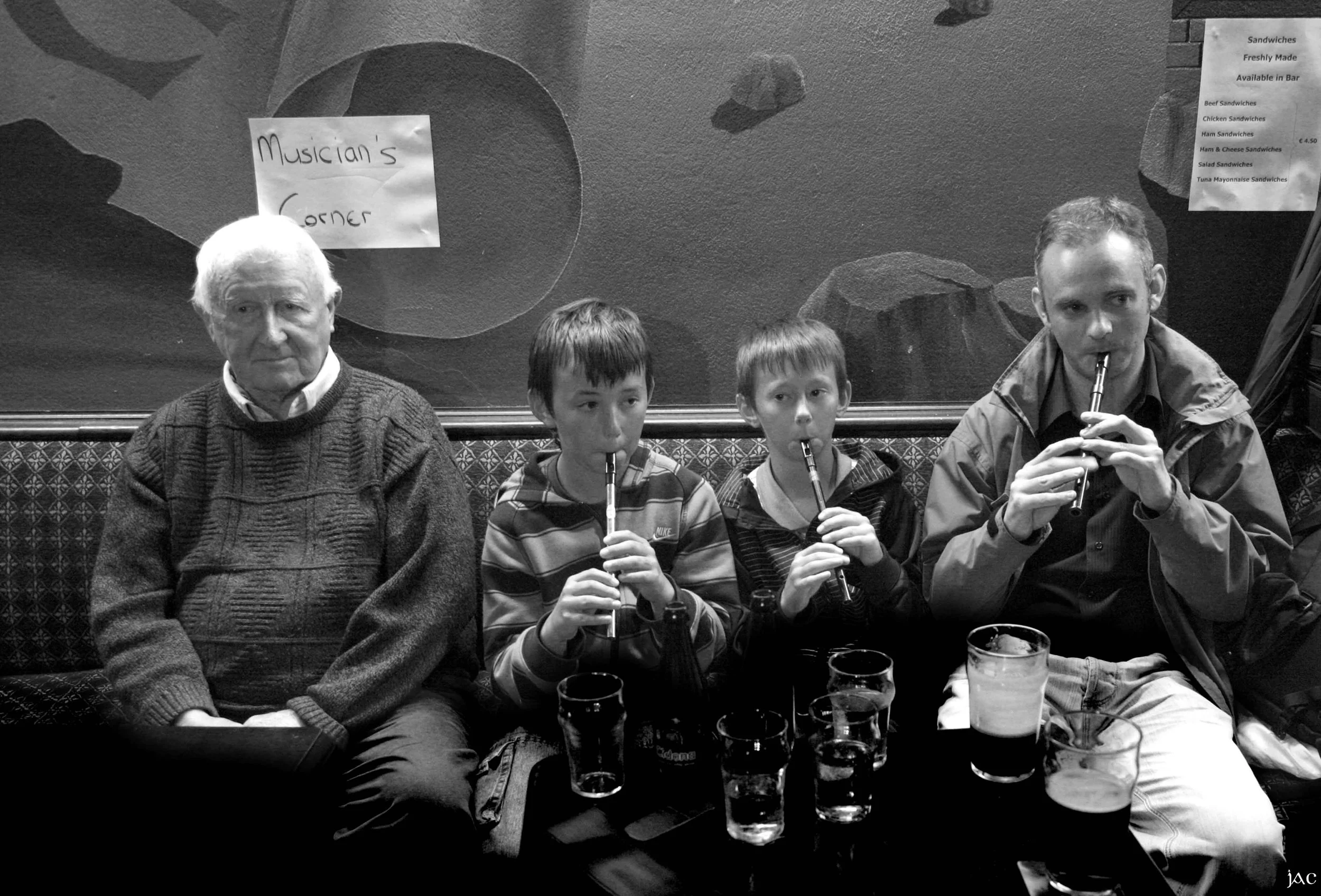 Ciarán Somers, on right, with two young whistle players.