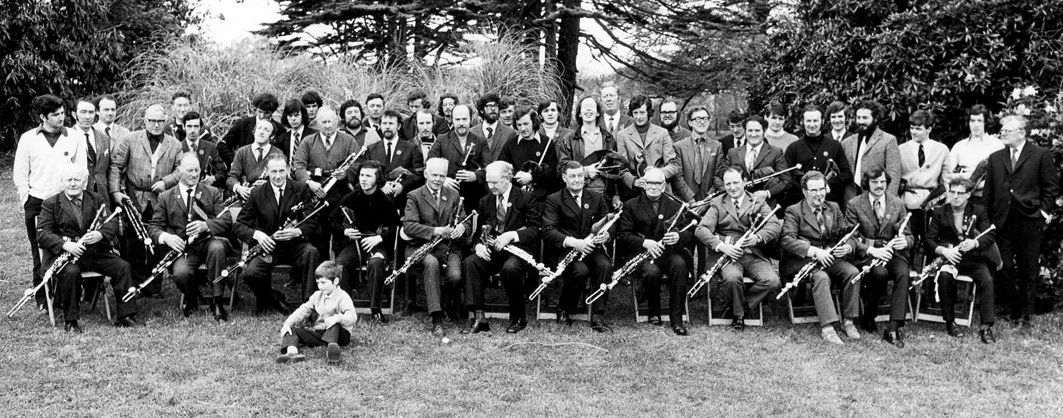 Pipers gathered at the 1972 Tionól in Termonfeckin, Co. Louth. Willie Clancy sits at the front, sixth from the left. This would be his last Tionól as he died in January 1973. 
Photo courtesy of NPU.
