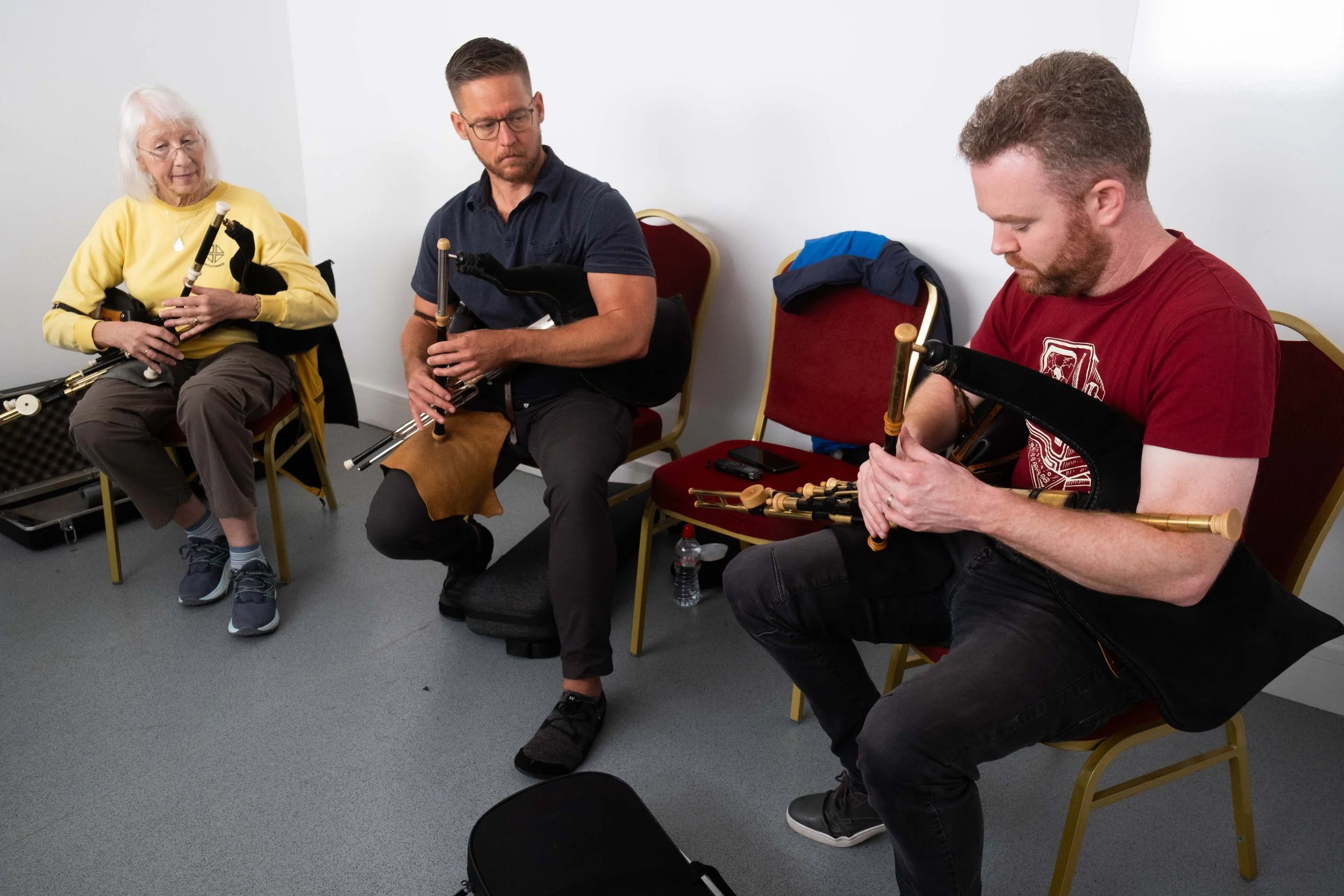 Mark Redmond (right) with his uilleann pipes students 2022.