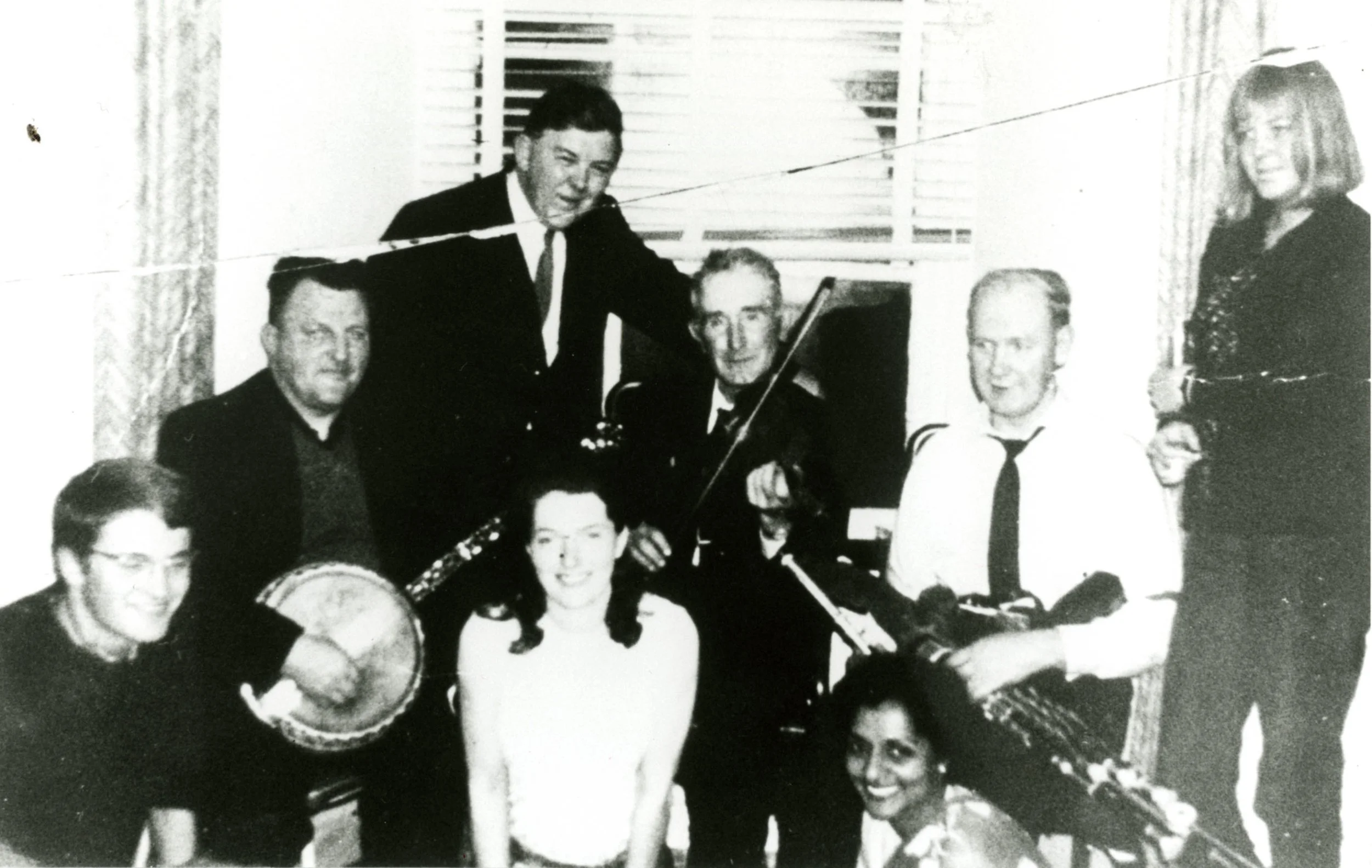 Jimmy Ward (banjo), Ciarán Mac Mathúna (standing), Junior Crehan (fiddle) and Willie Clancy, late 1960s.