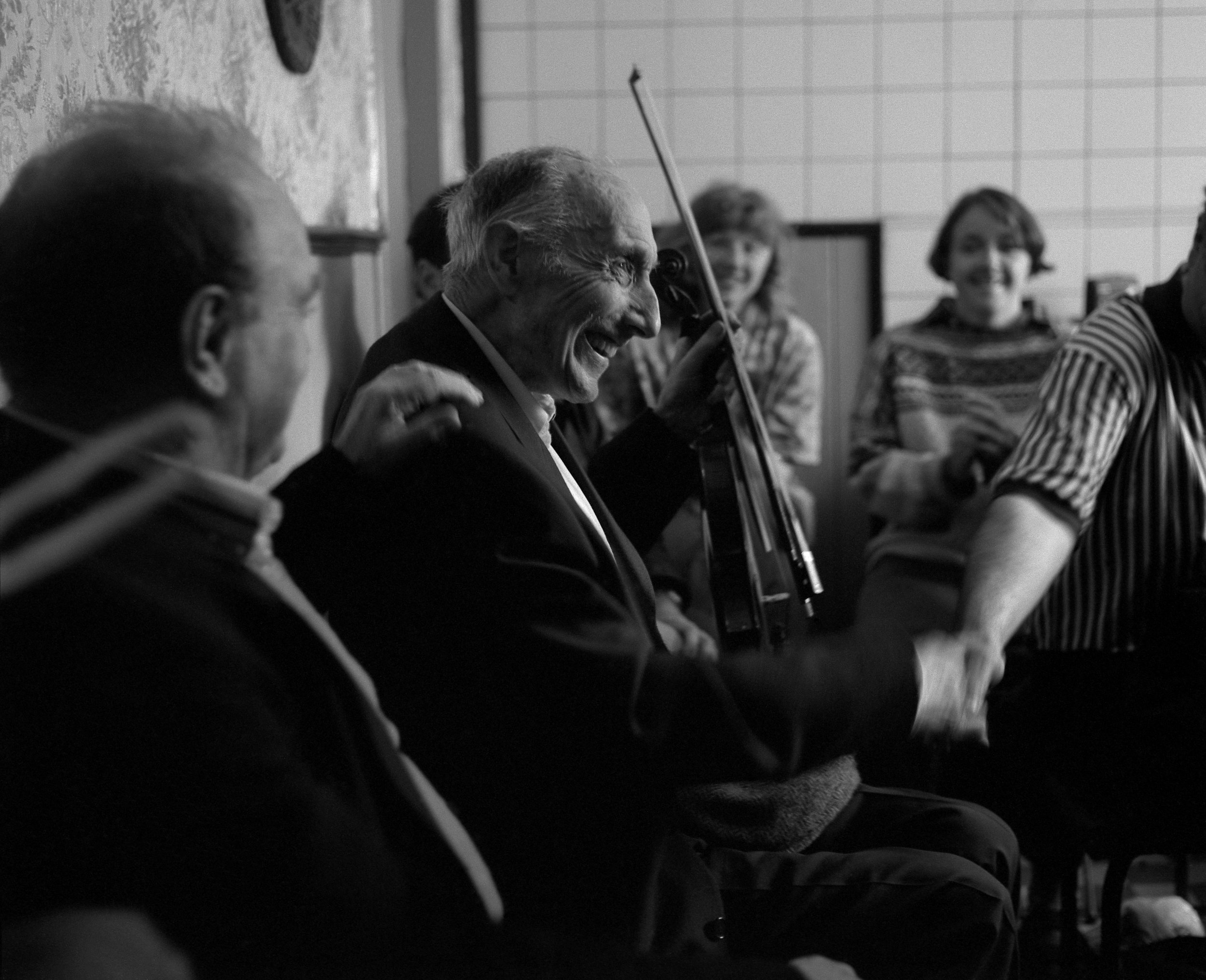 John Moloney after playing a solo tune in Aggie Cleary's pub 1998.
