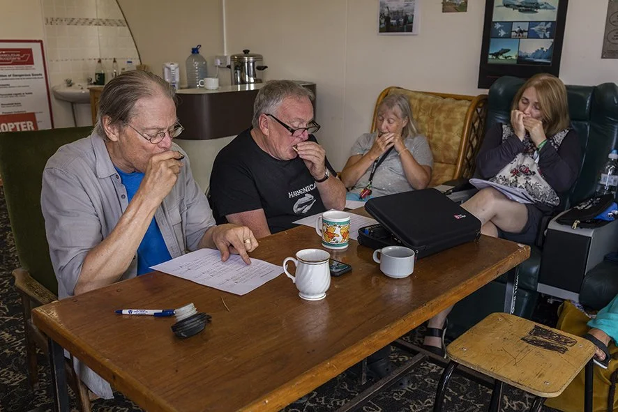 Rick Epping and Mick Kinsella with their harmonica students.