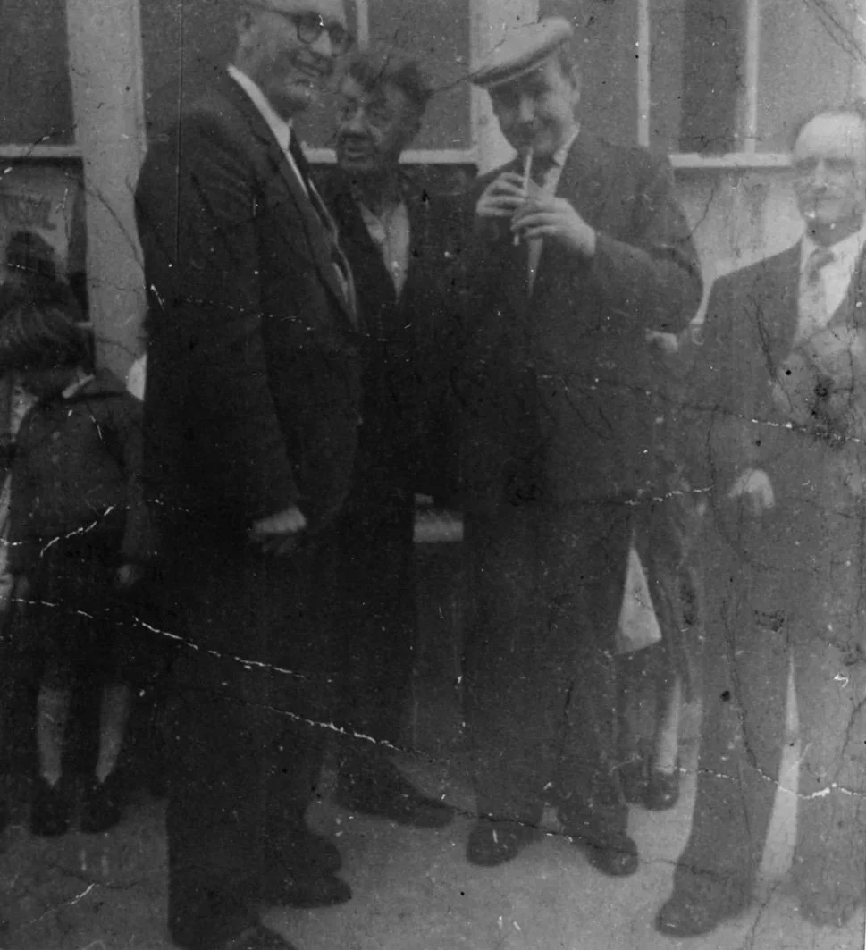 Willie Clancy playing the tin whistle for Denis 'The Weaver' Murphy (left) and Pádraig O'Keeffe (centre), Killarney Co. Kerry, early 1960s.
Photo courtesy of NPU.