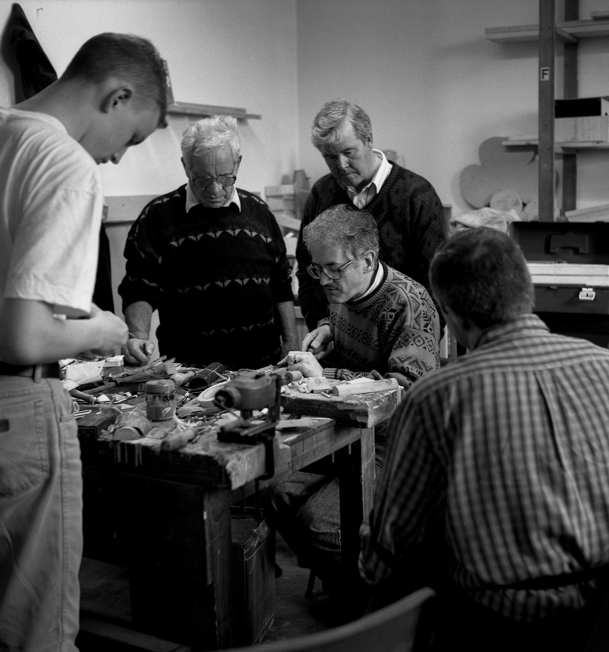 Dave Hegarty demonstrating reed making techniques with Peter Carberry (centre left) watching on 1998.