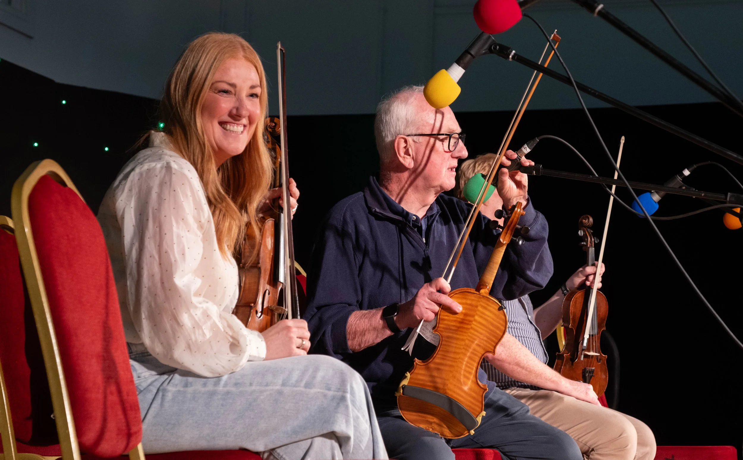 Leah and John Kelly during the fiddle recital 2025.