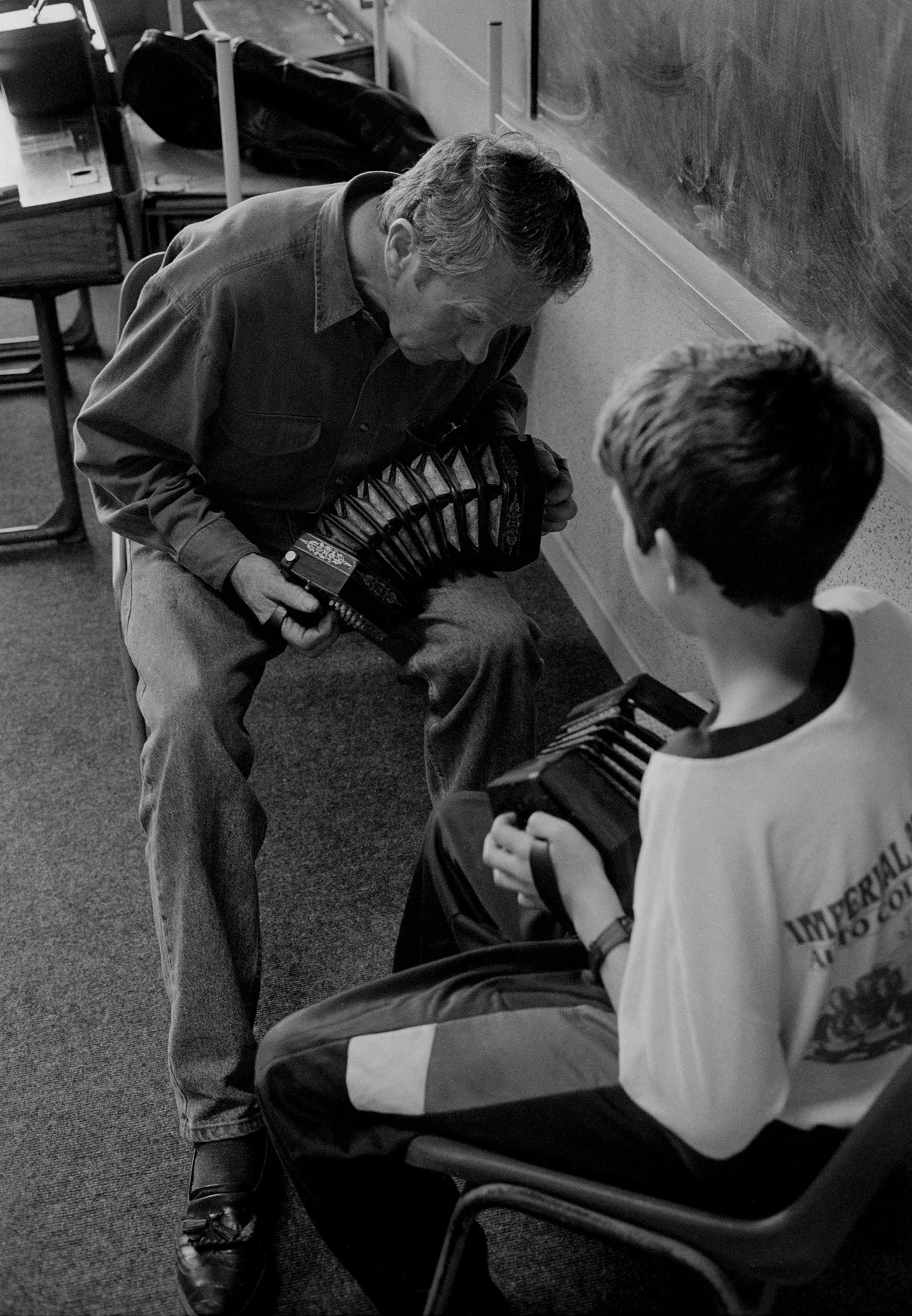 Tommy McCarthy with a young concertina student 1992.