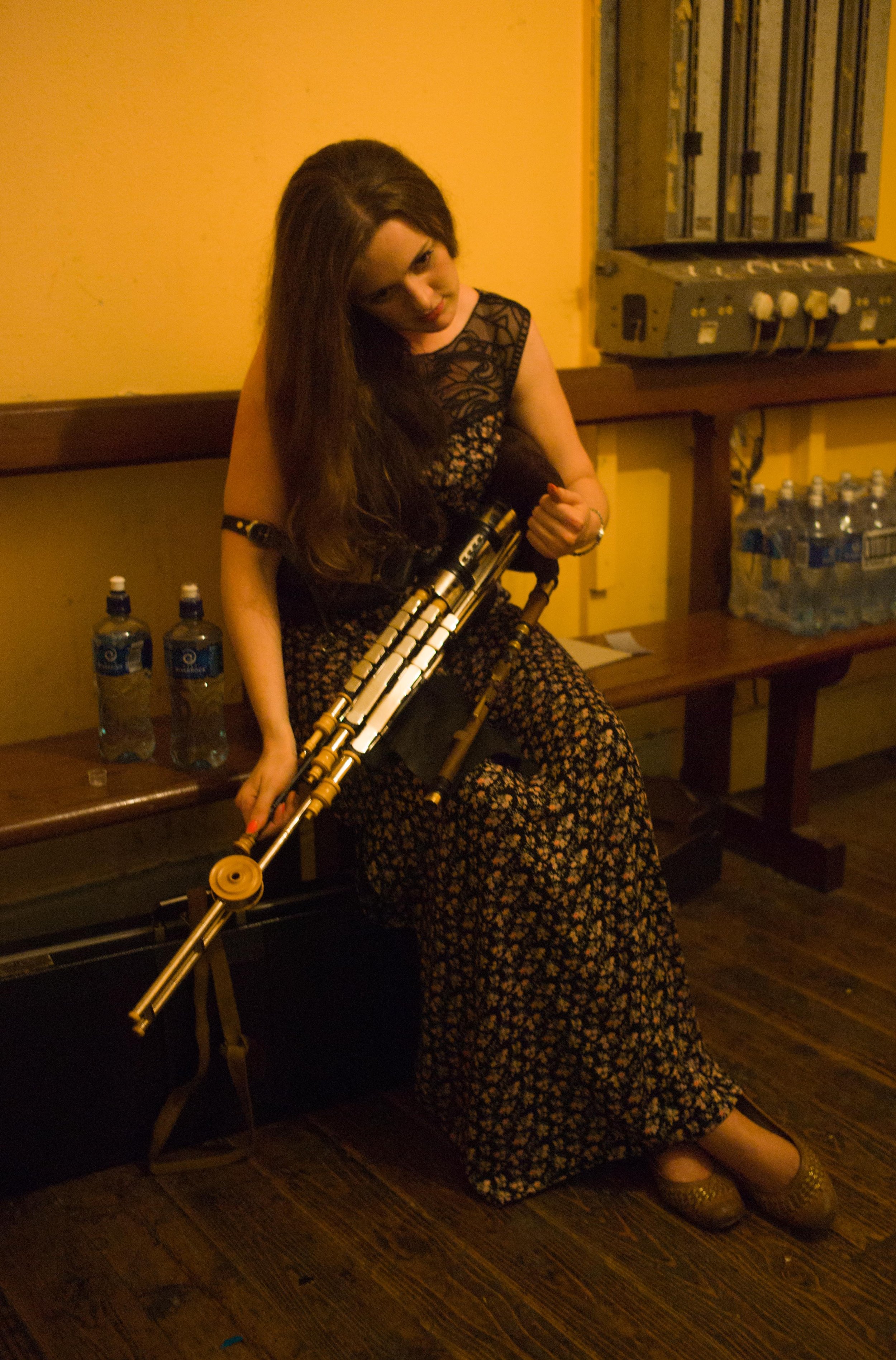 Sheila Friel tuning up before performing at the 2013 uilleann pipes recital.