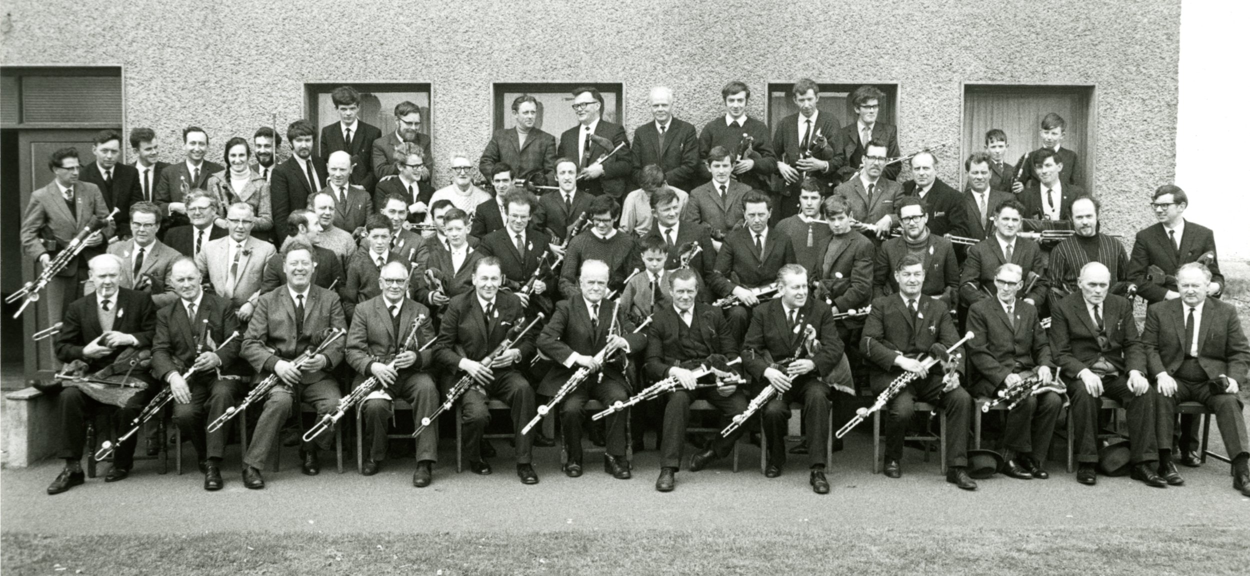 Pipers gather at the second annual Na Píóbairí Uilleann Tionól at Bettystown, Co. Meath in 1969. Willie Clancy is seated front row far left. 
Photo courtesy of NPU.